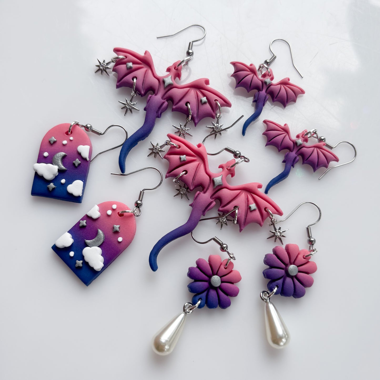 DRAGON EARRINGS (BI FLAG)