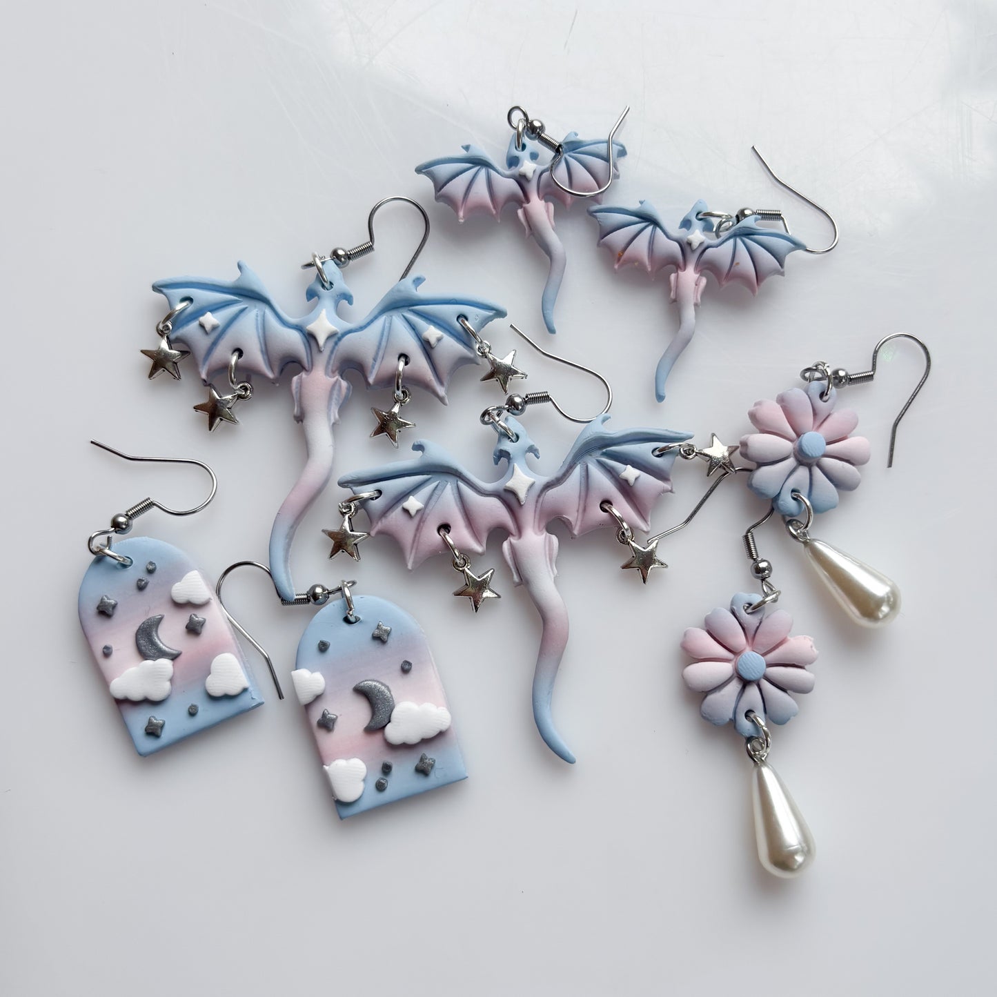 DRAGON EARRINGS (TRANS FLAG)