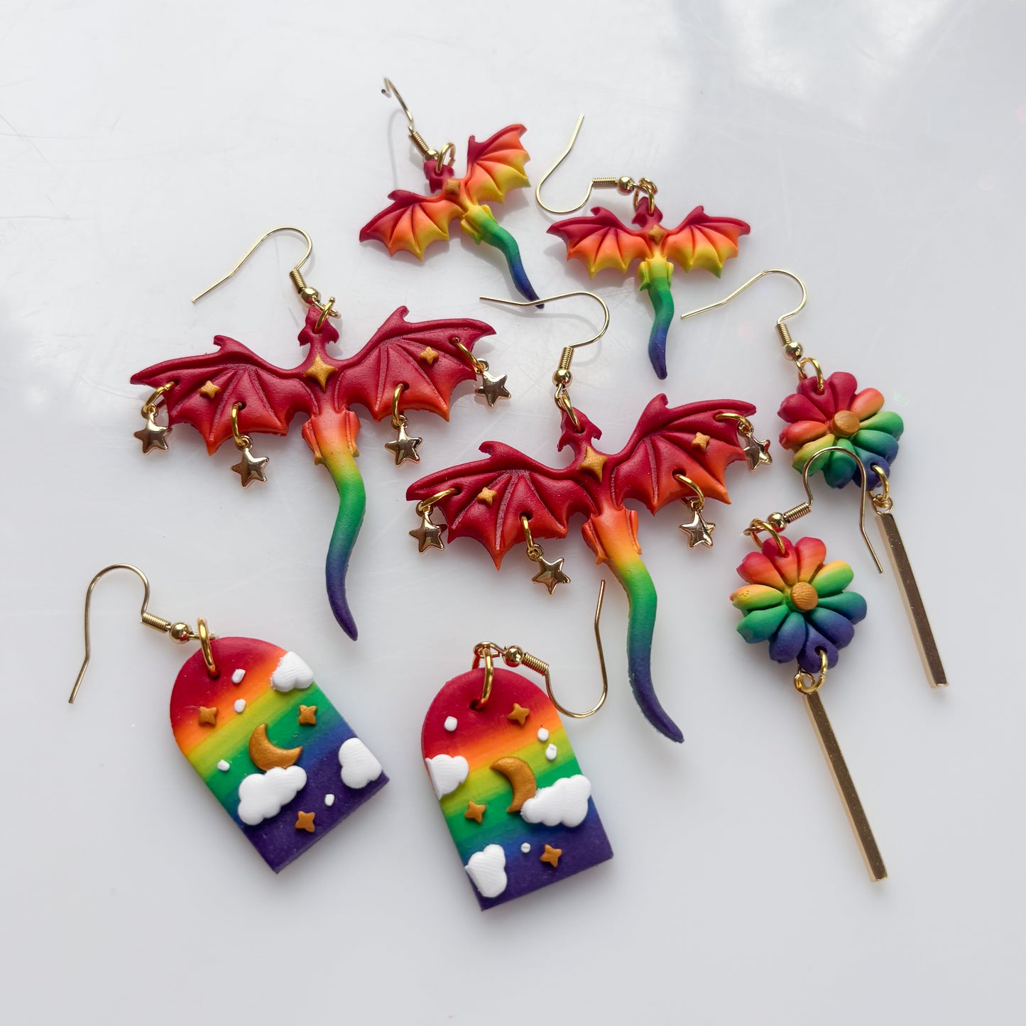 MINI DRAGON EARRINGS (RAINBOW FLAG)