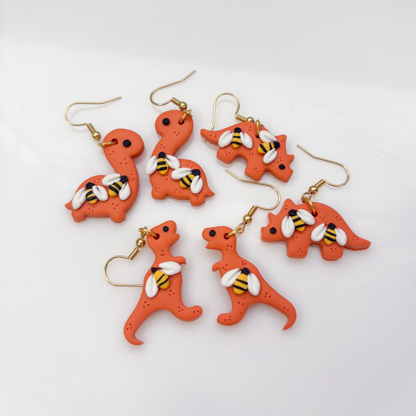 ORANGE BEE DINO EARRINGS (BRONTO)