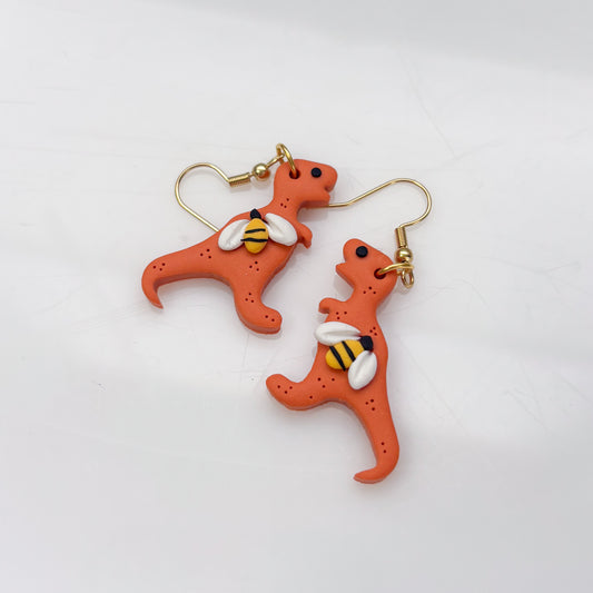 ORANGE BEE DINO EARRINGS (T REX)