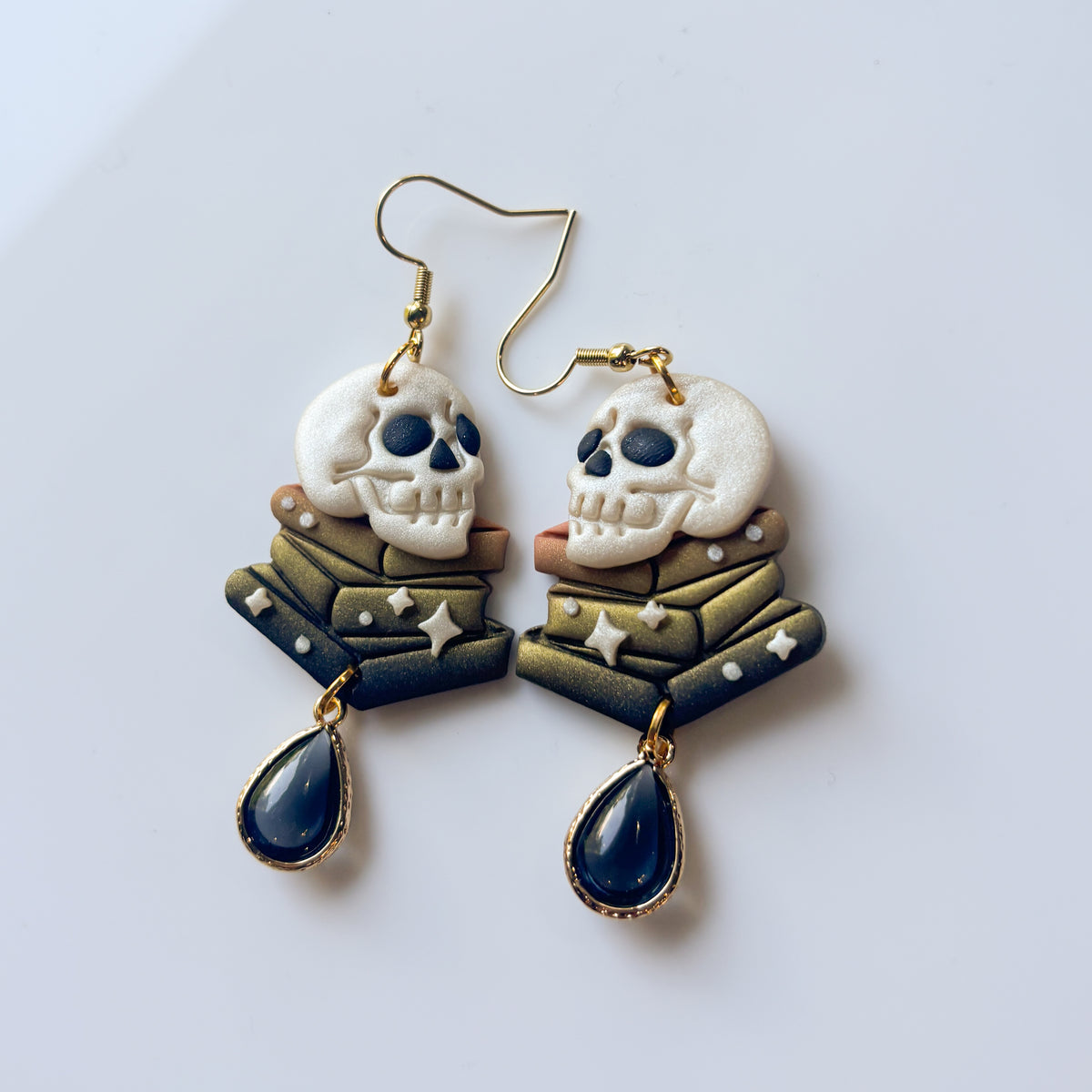 SKULLS ON BOOKS EARRINGS