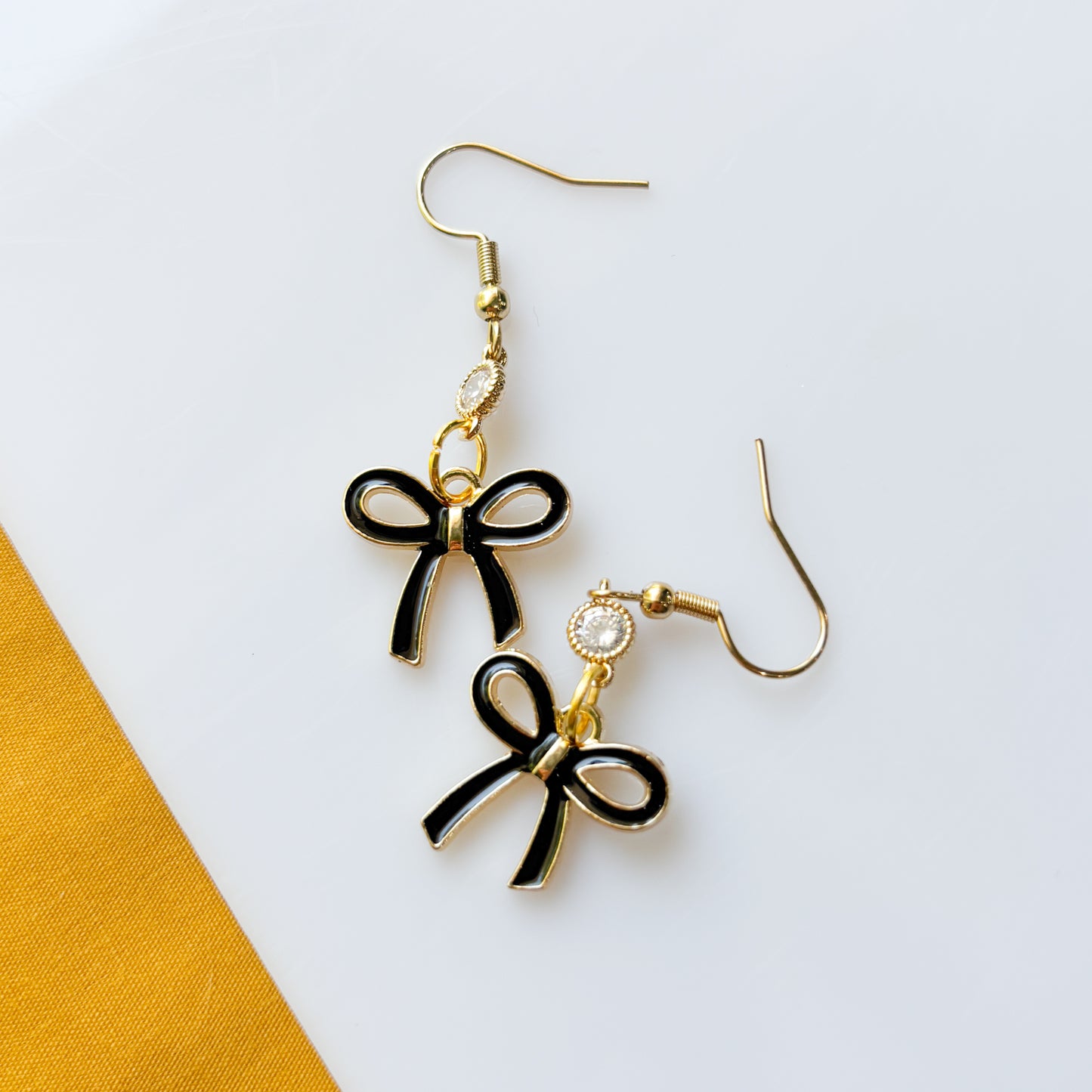 BLACK BOW CHARM EARRINGS