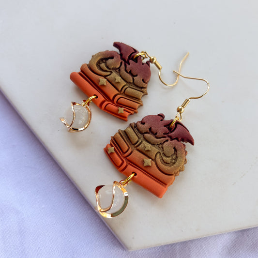 DRAGON ON BOOKS EARRINGS (BRICK BRONZE ORANGE)