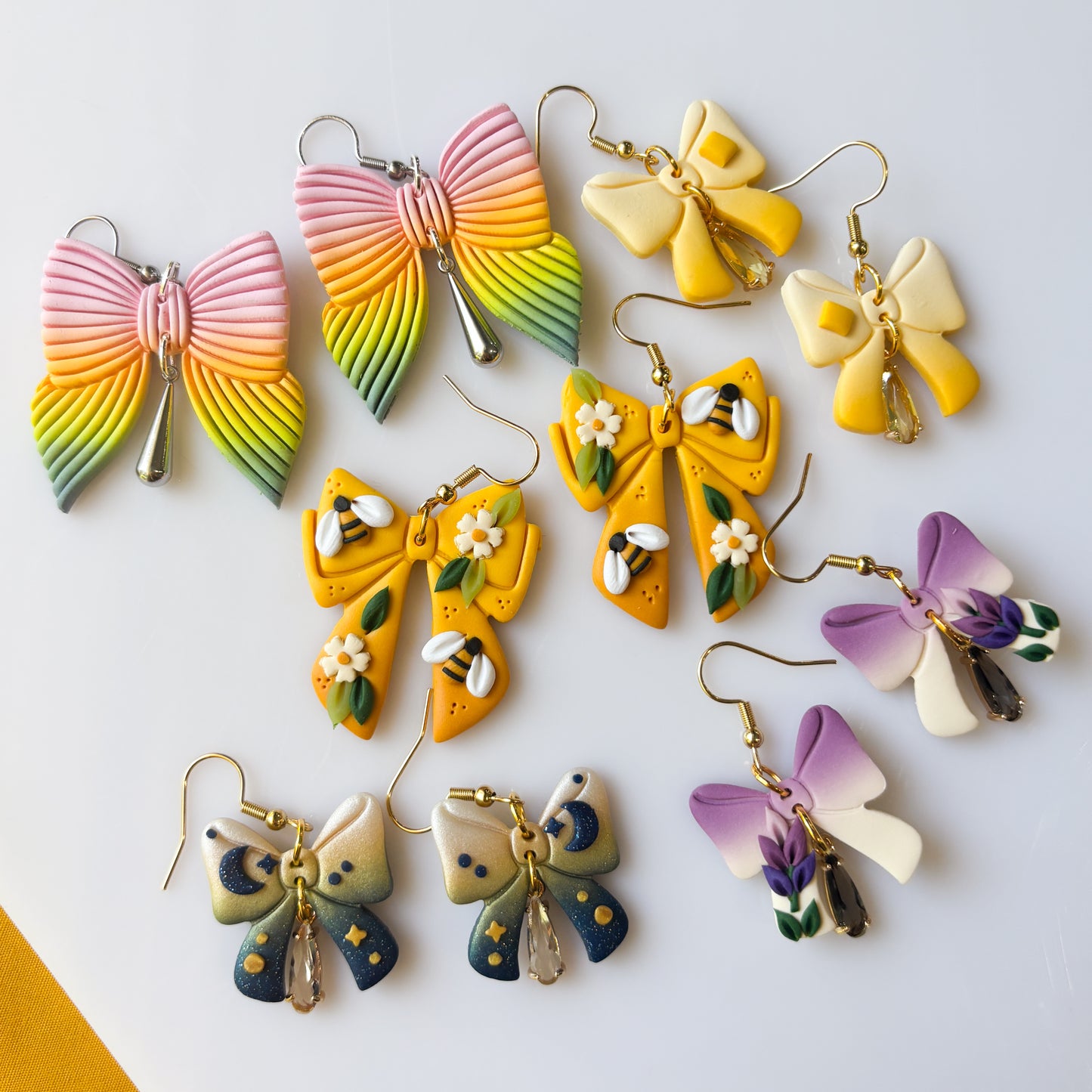 BUTTER BOW EARRINGS