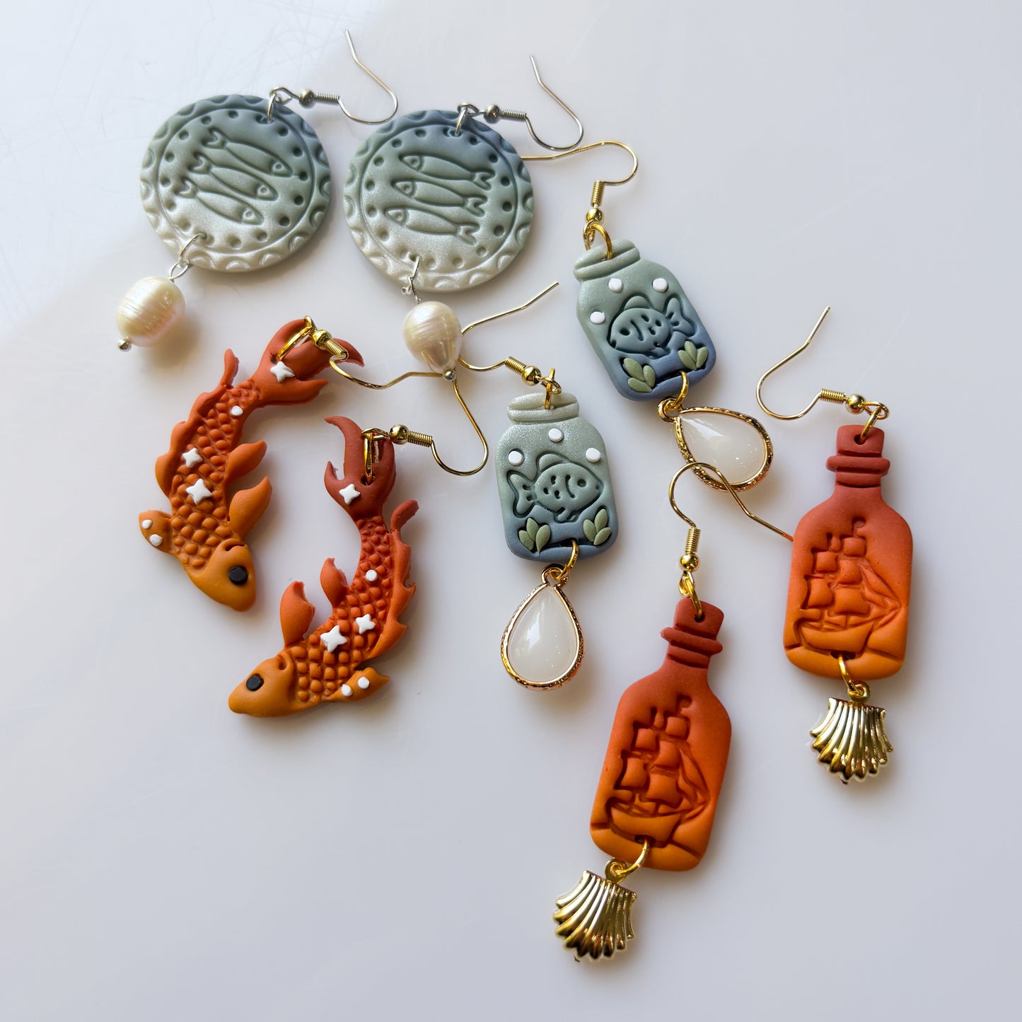 FISH TRIO CIRCLE EARRINGS