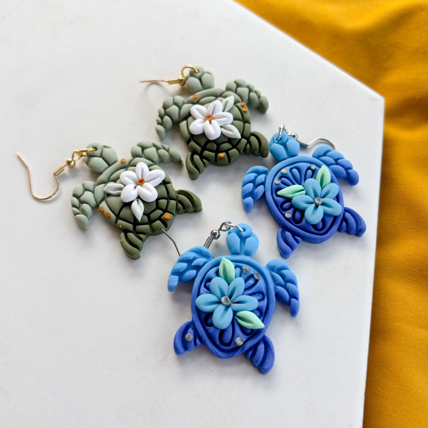 BLUE FLOWER TURTLE EARRINGS