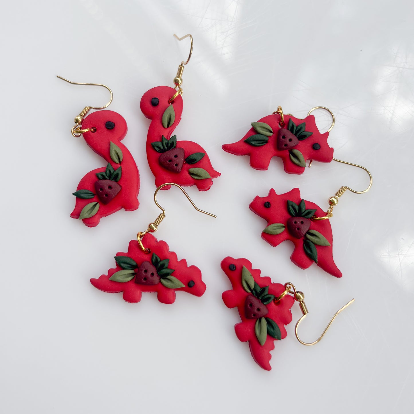 RED STRAWBERRY DINO EARRINGS (BRONTO)