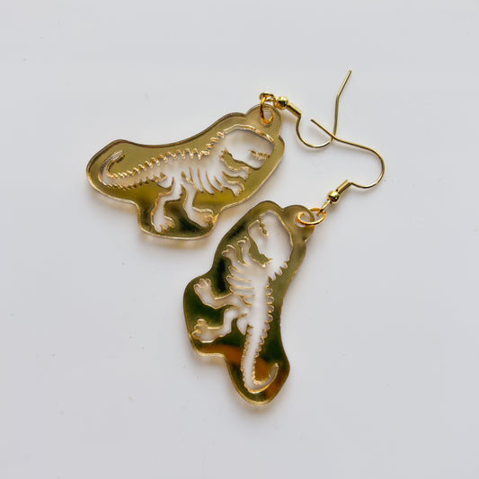 GOLD T-REX SKELETON ACRYLIC EARRINGS