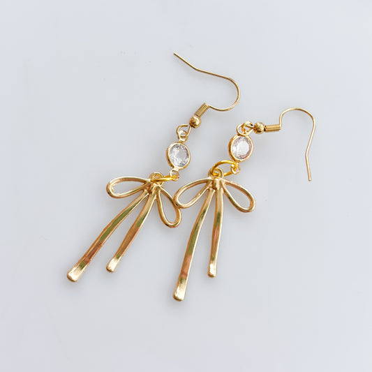 LONG GOLD BOW & GEM CHARM EARRINGS