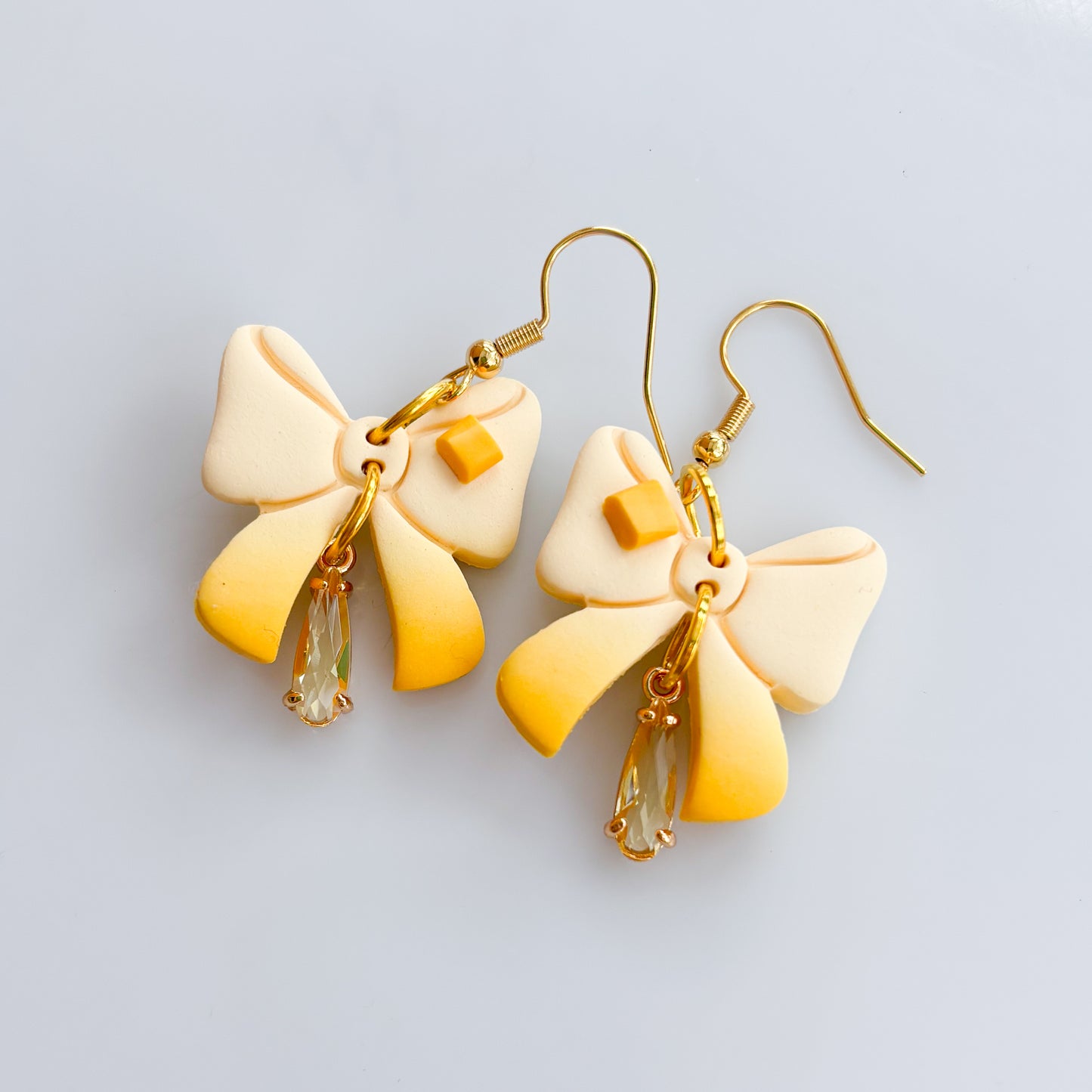 BUTTER BOW EARRINGS
