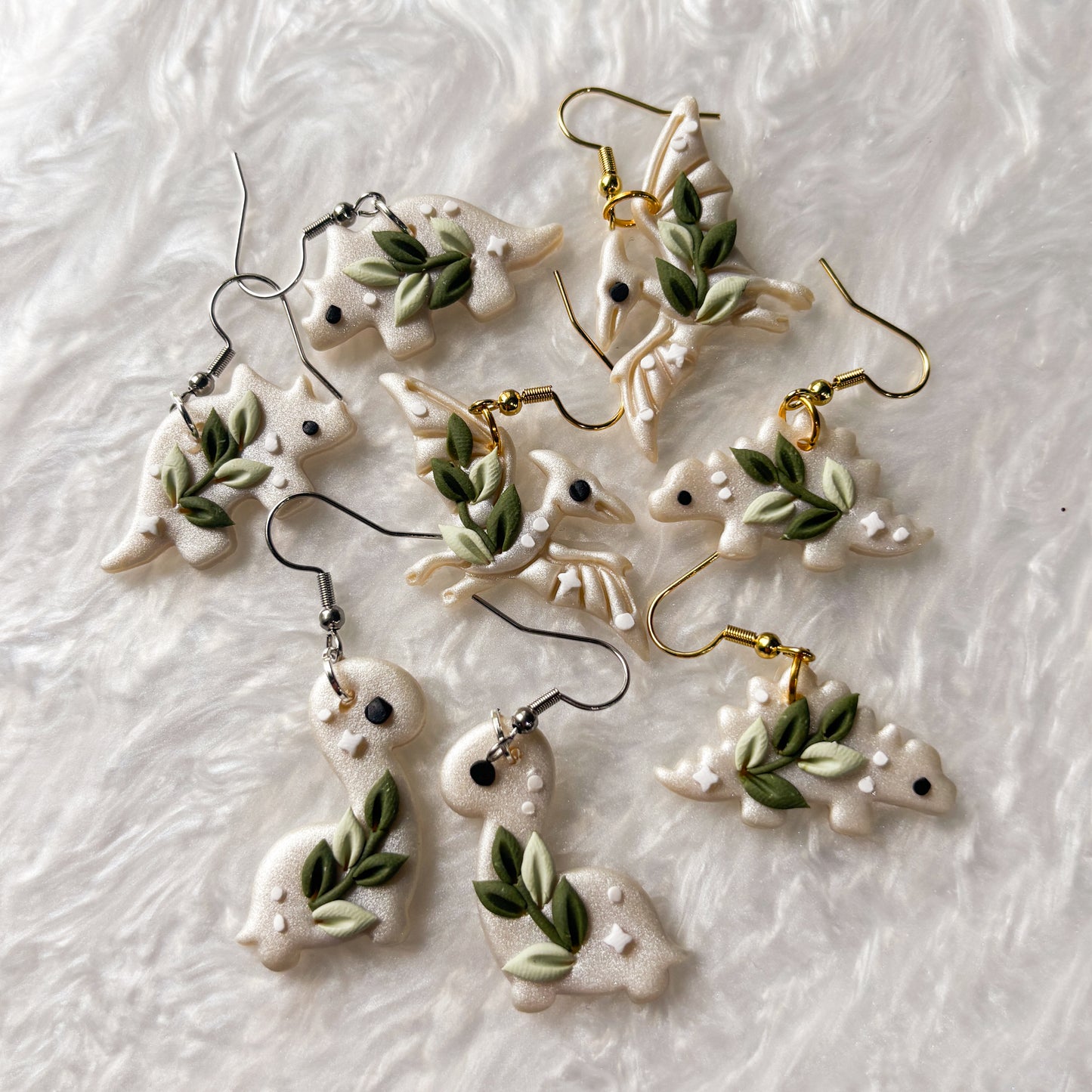 CELESTIAL VINE DINO EARRINGS (STEGOSAURUS)