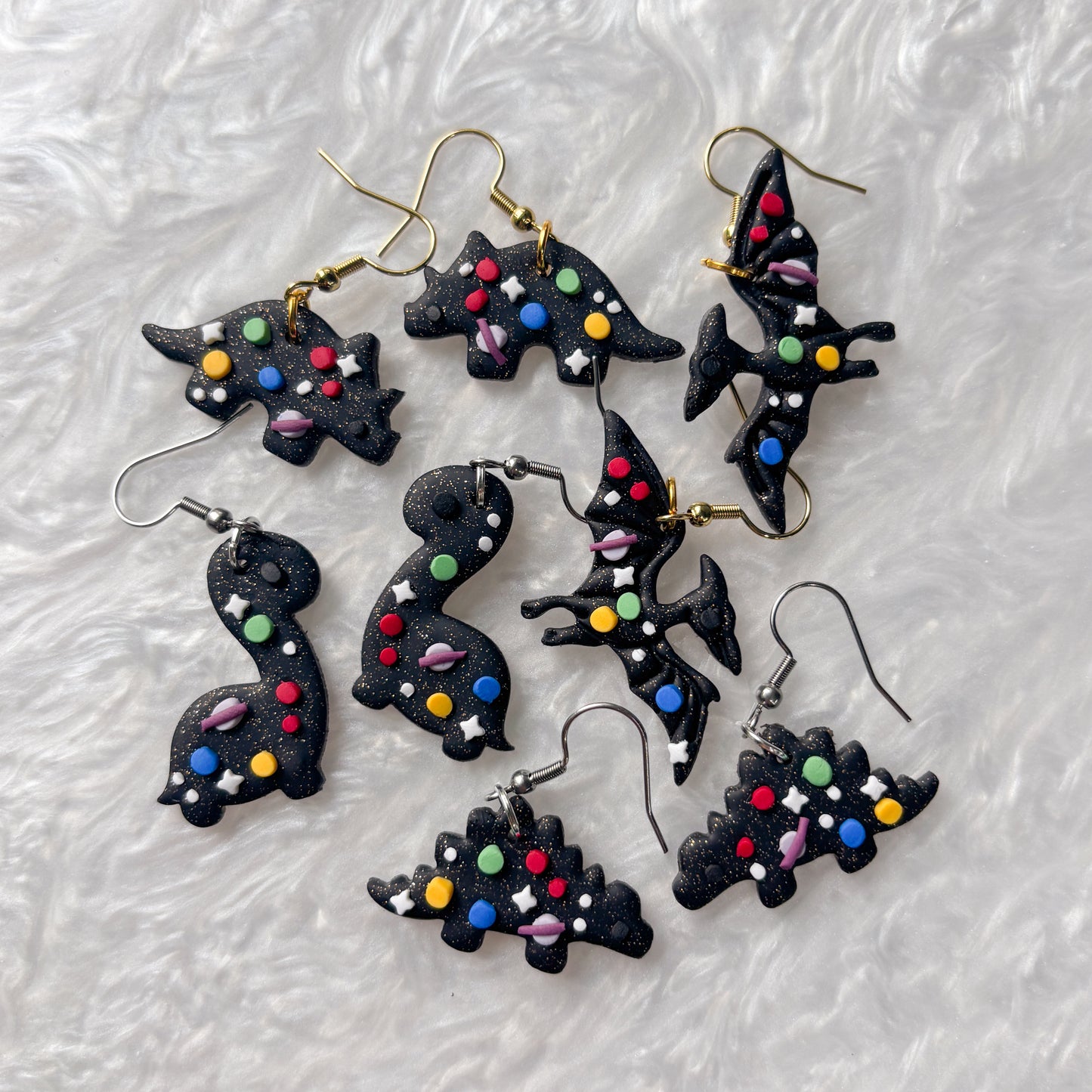 SPACE DINO EARRINGS (STEGOSAURUS)