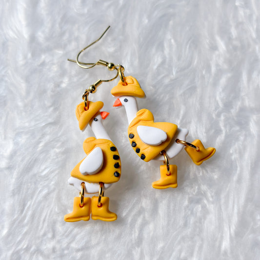 YELLOW RAIN COAT GEESE