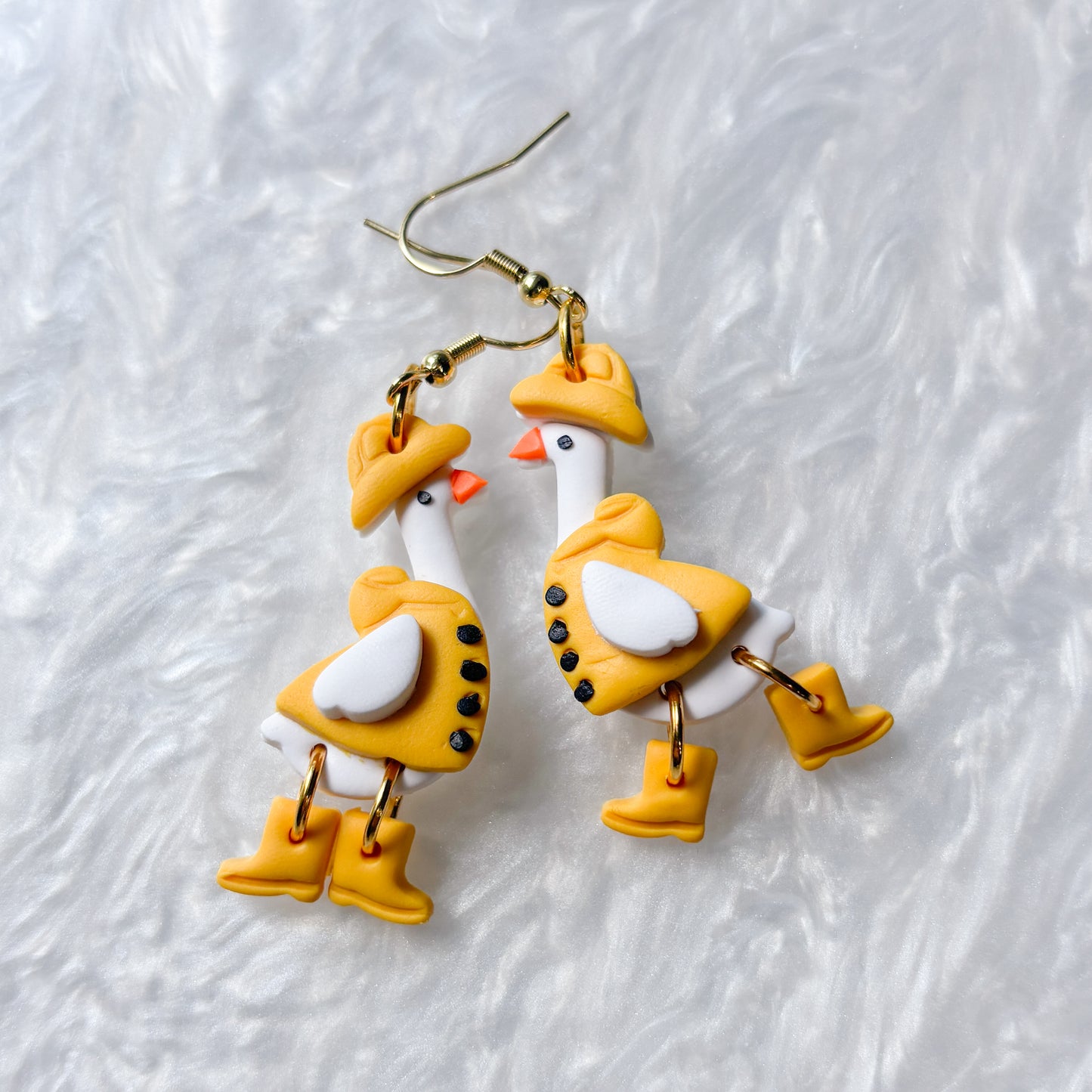 YELLOW RAIN COAT GEESE