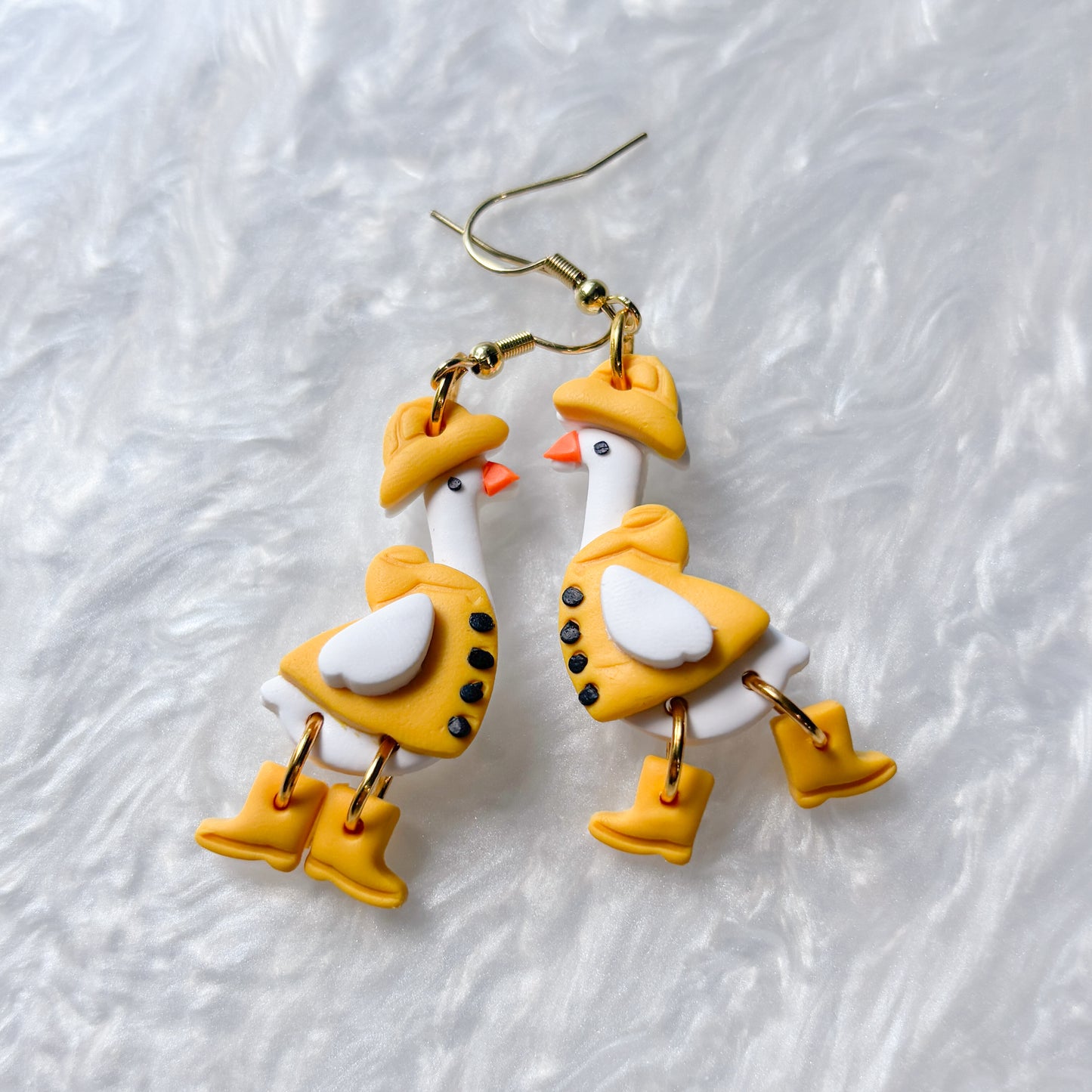 YELLOW RAIN COAT GEESE