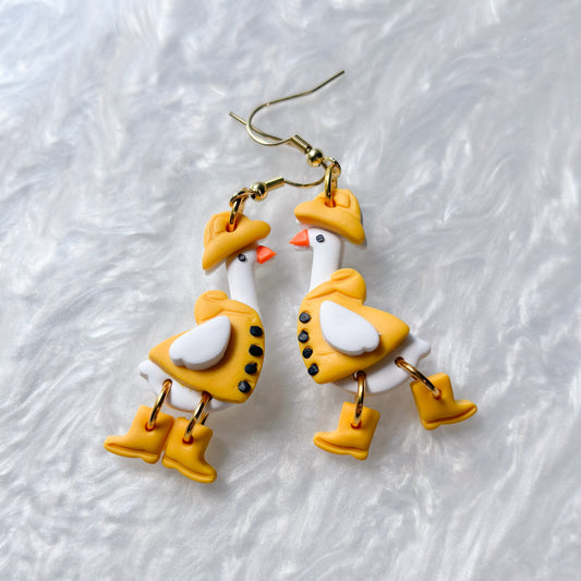 YELLOW RAIN COAT GEESE