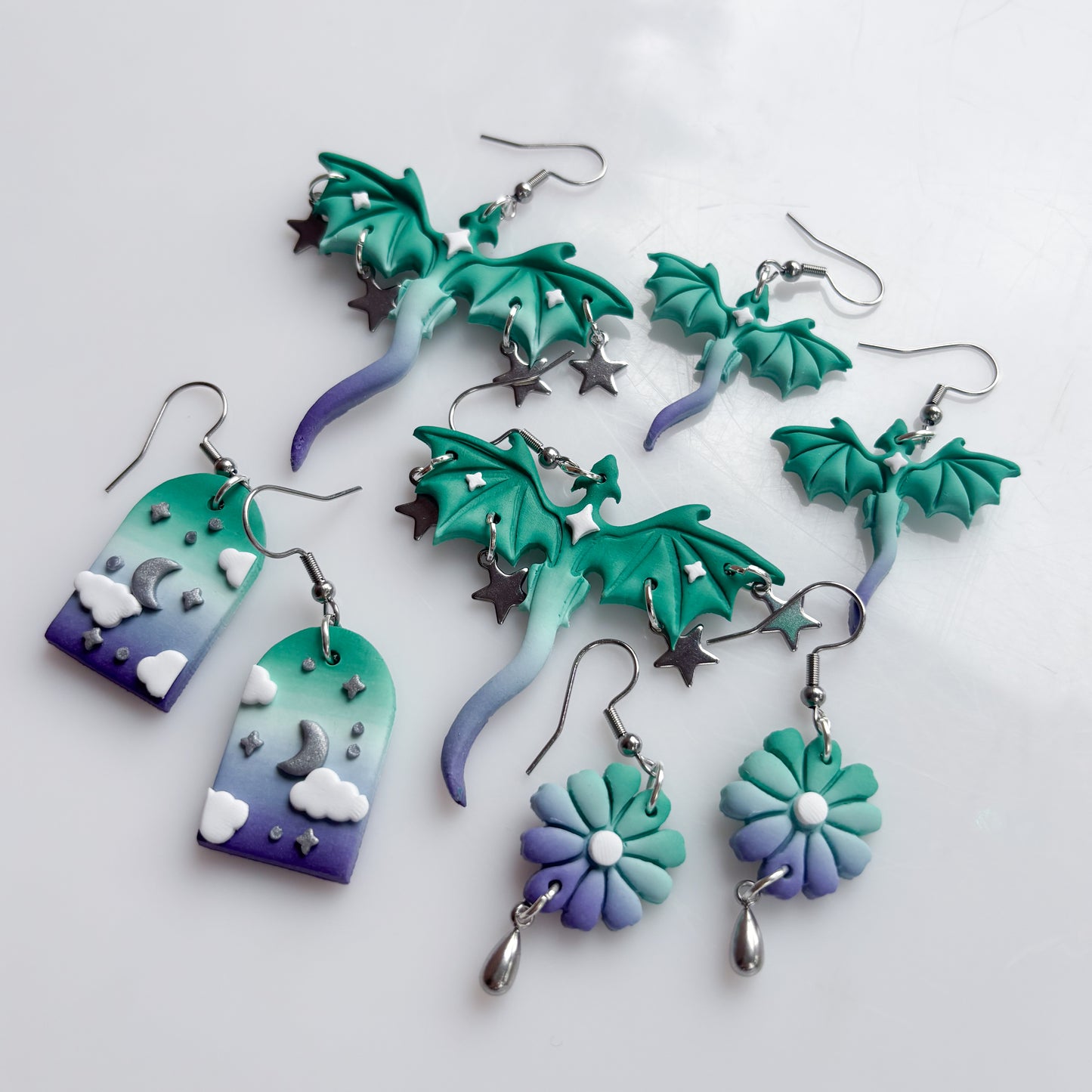 DRAGON EARRINGS (GAY/MLM FLAG)