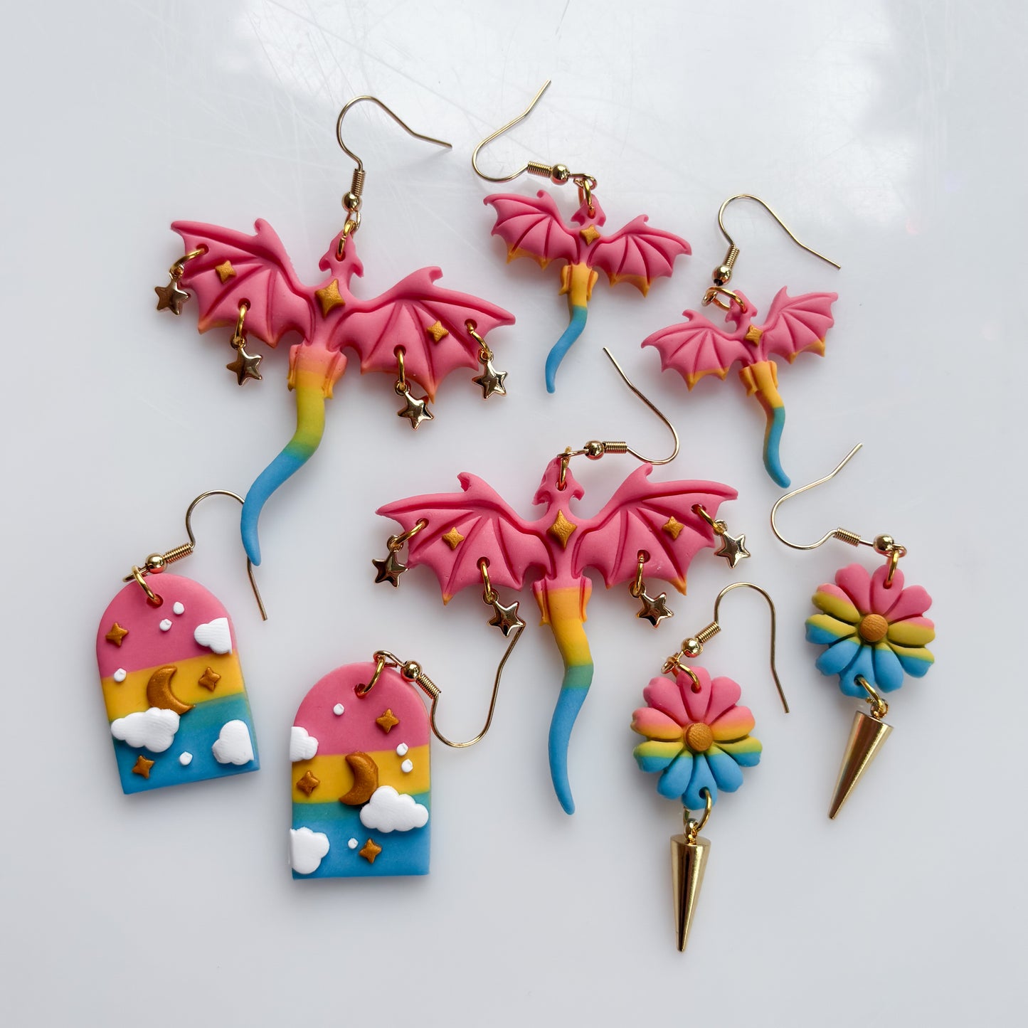 CLOUDY ARCH EARRINGS (PAN FLAG)