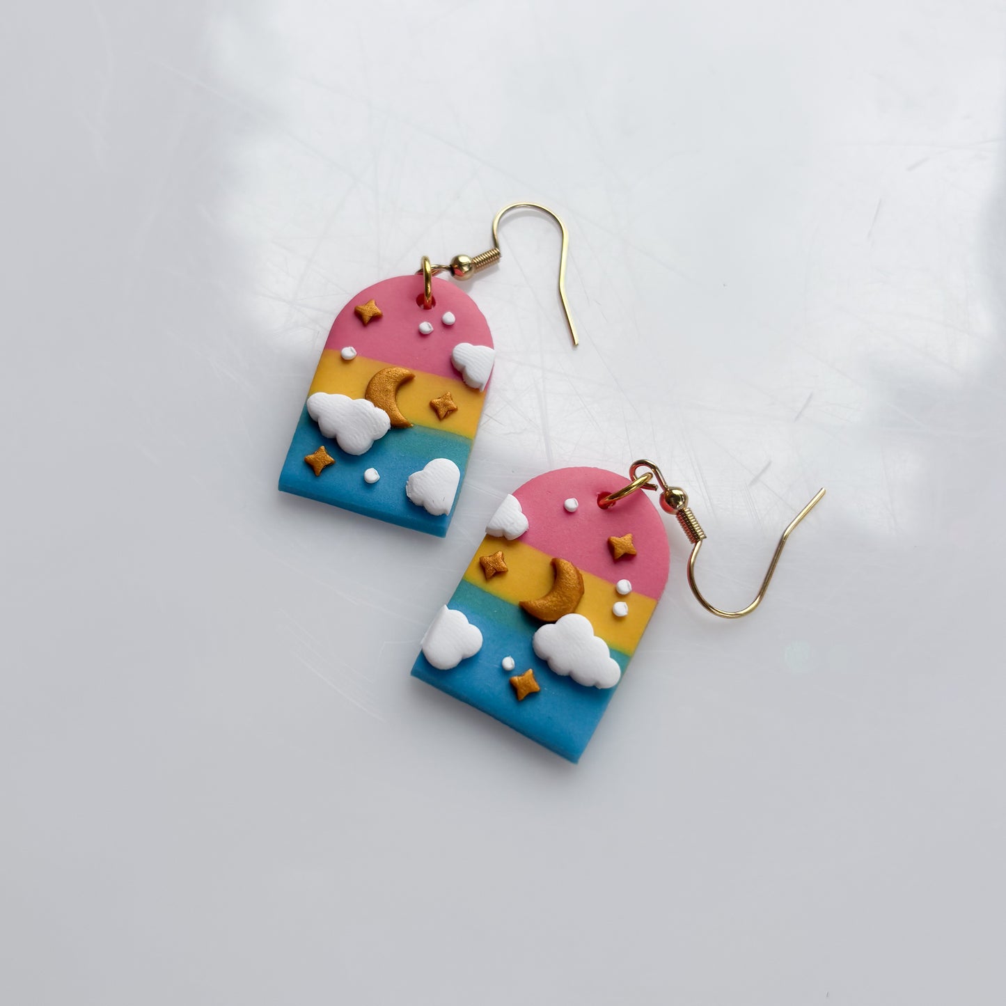 CLOUDY ARCH EARRINGS (PAN FLAG)