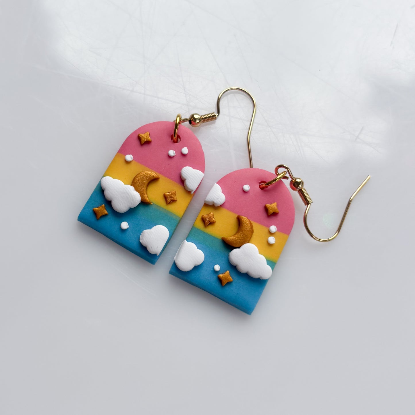 CLOUDY ARCH EARRINGS (PAN FLAG)