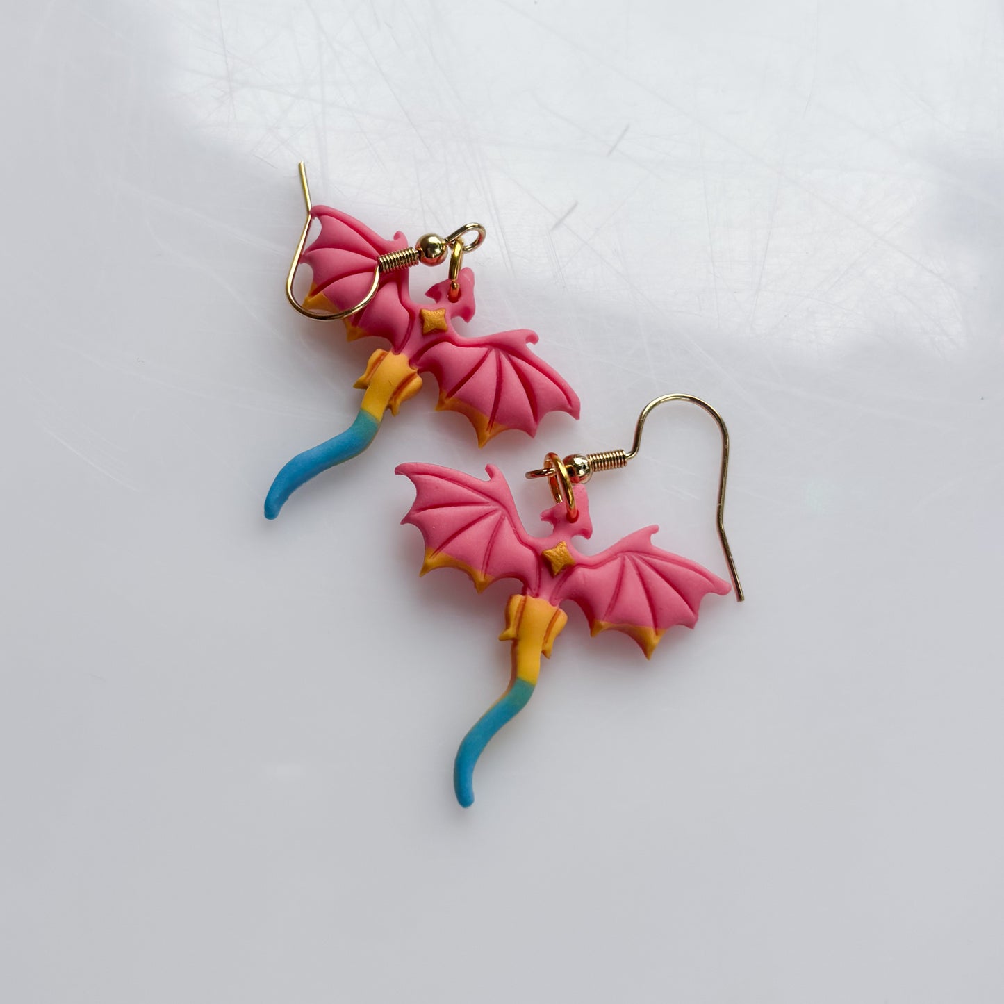 MINI DRAGON EARRINGS (PAN FLAG)