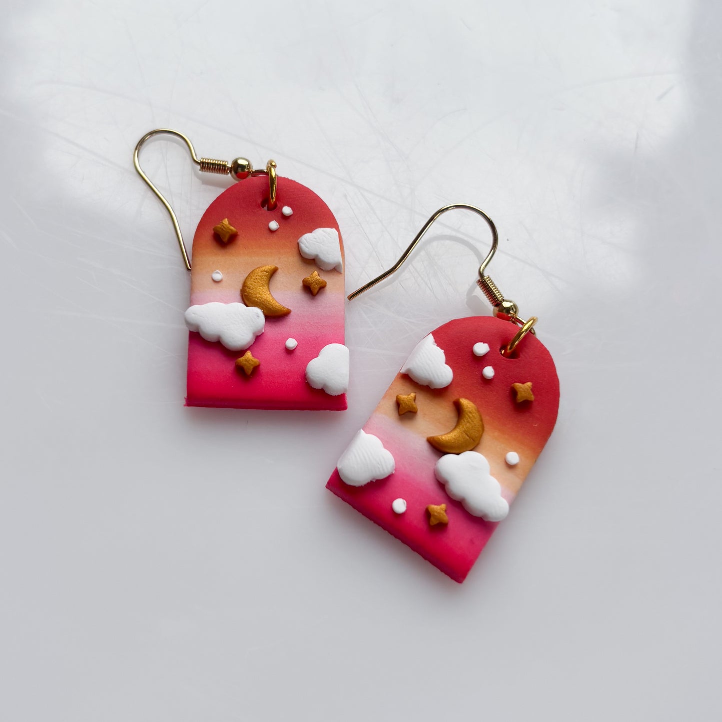 CLOUDY ARCH EARRINGS (LESBIAN FLAG)