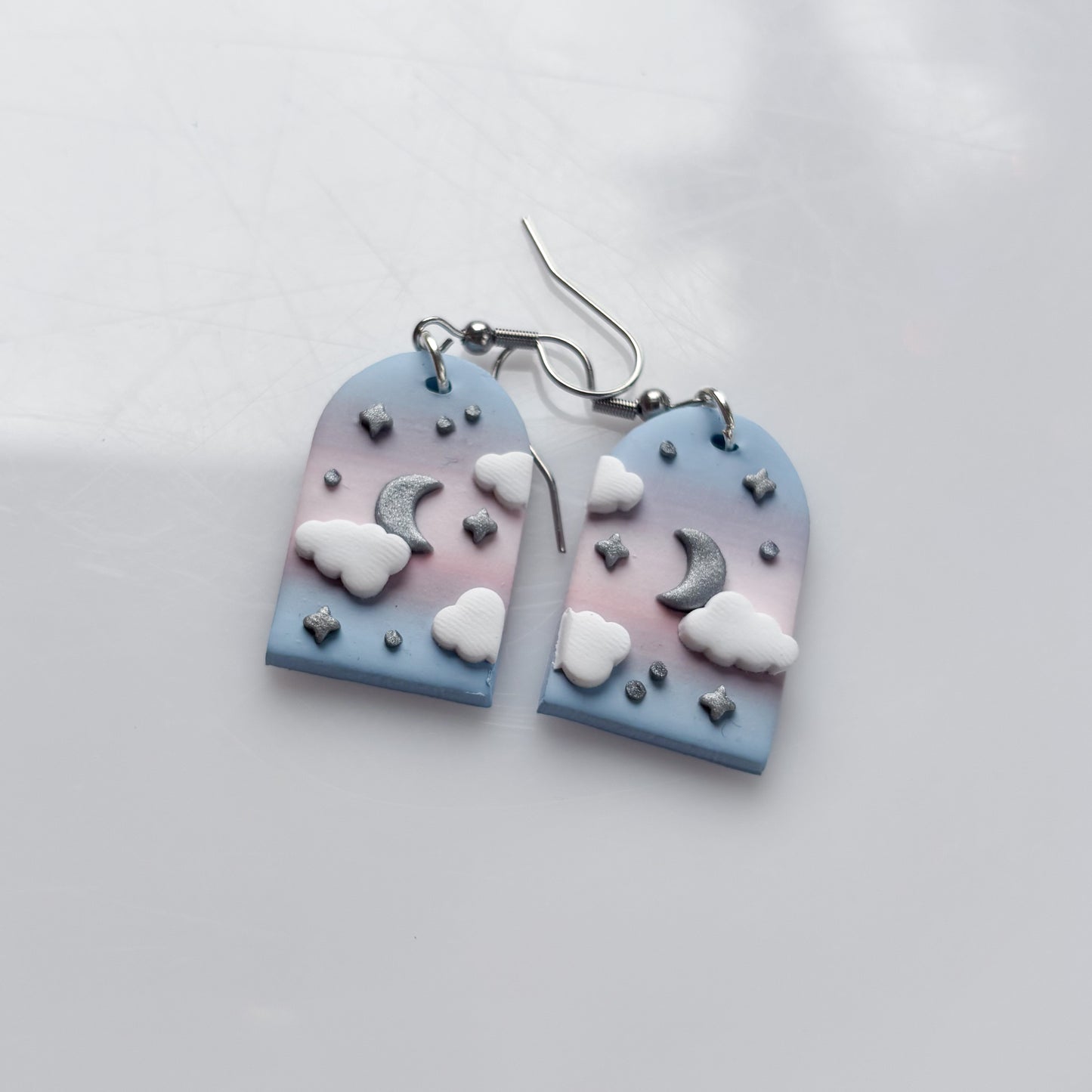 CLOUDY ARCH EARRINGS (TRANS FLAG)