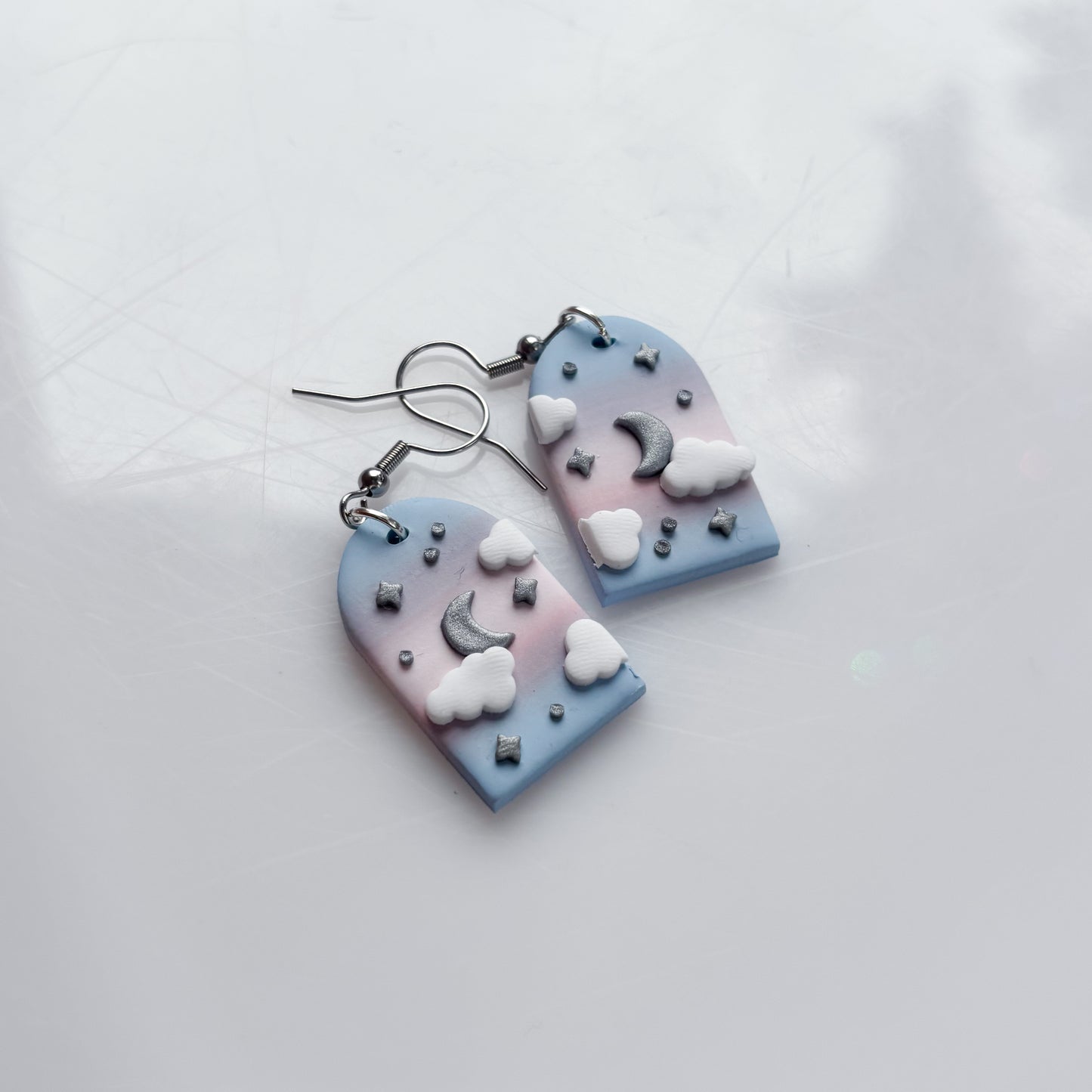 CLOUDY ARCH EARRINGS (TRANS FLAG)