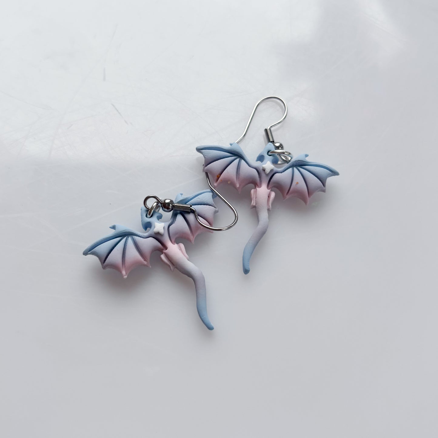 MINI DRAGON EARRINGS (TRANS FLAG)