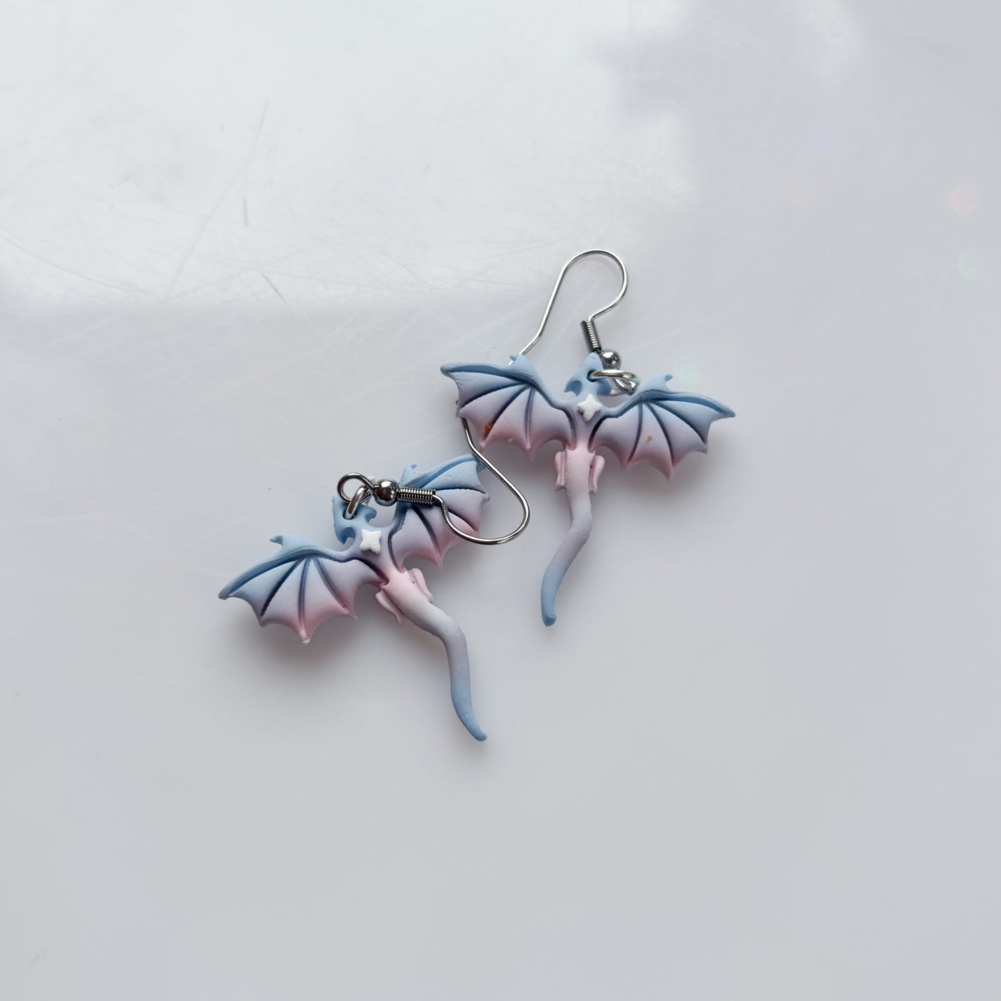 MINI DRAGON EARRINGS (TRANS FLAG)