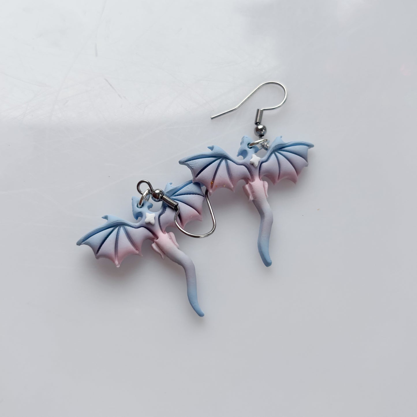 MINI DRAGON EARRINGS (TRANS FLAG)