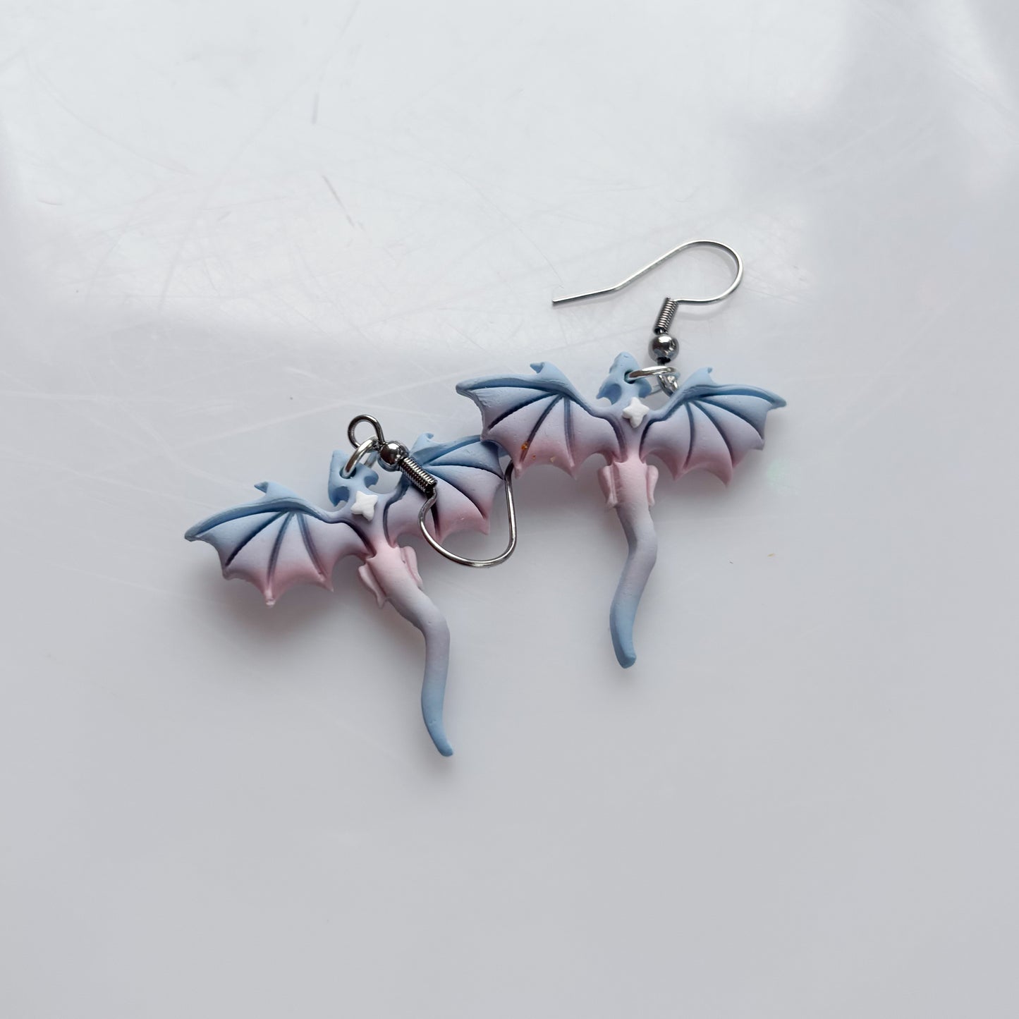 MINI DRAGON EARRINGS (TRANS FLAG)