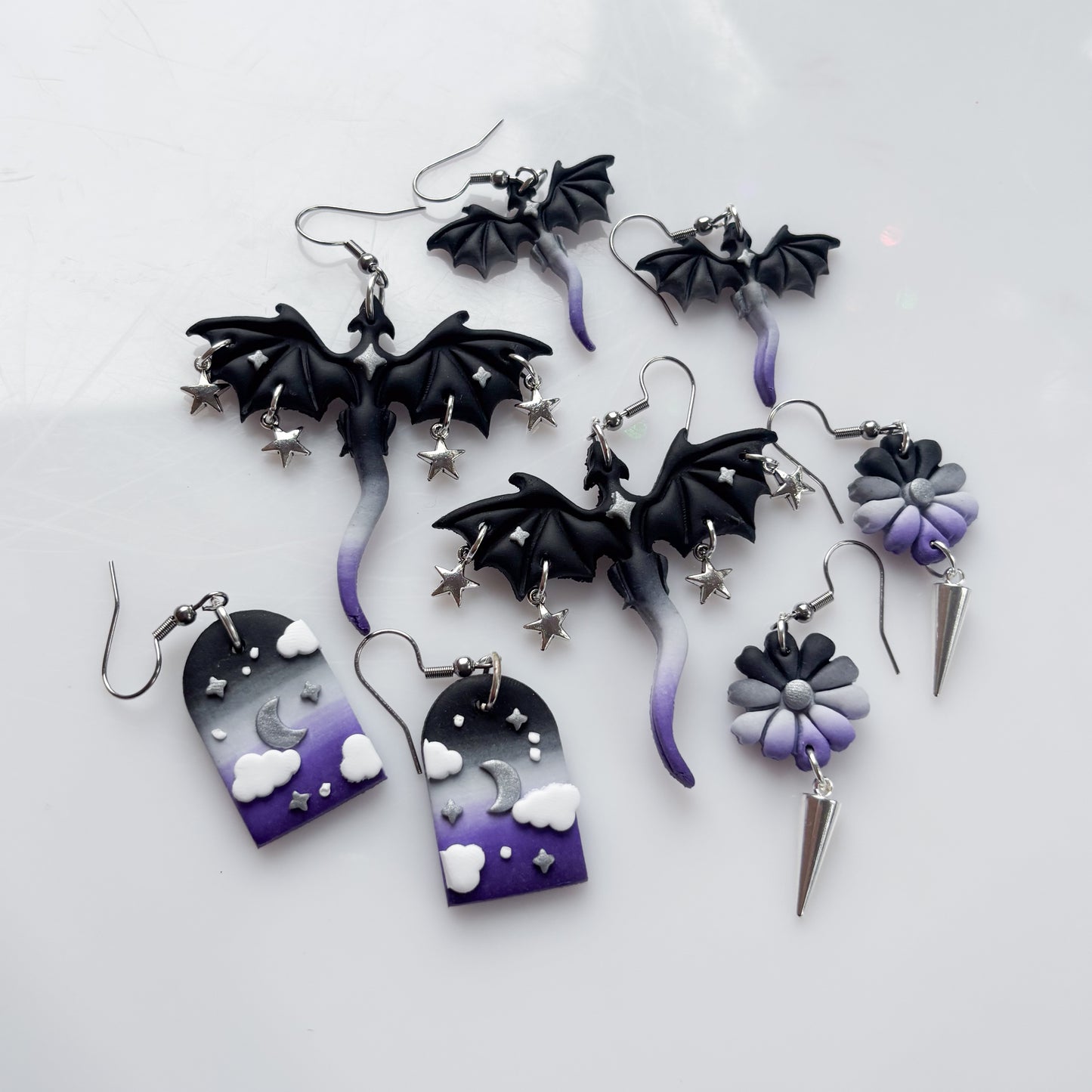 CLOUDY ARCH EARRINGS (ACE FLAG)