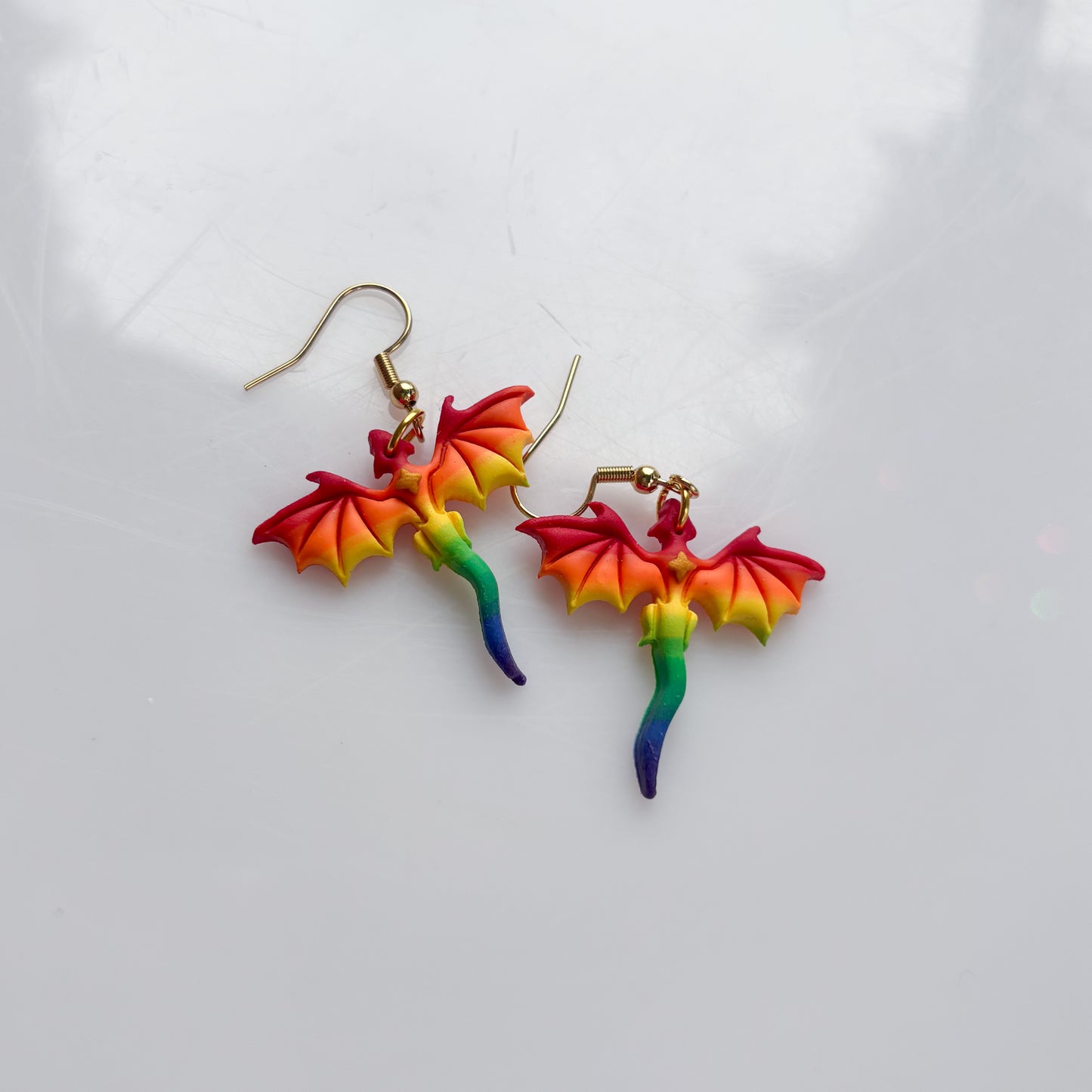 MINI DRAGON EARRINGS (RAINBOW FLAG)