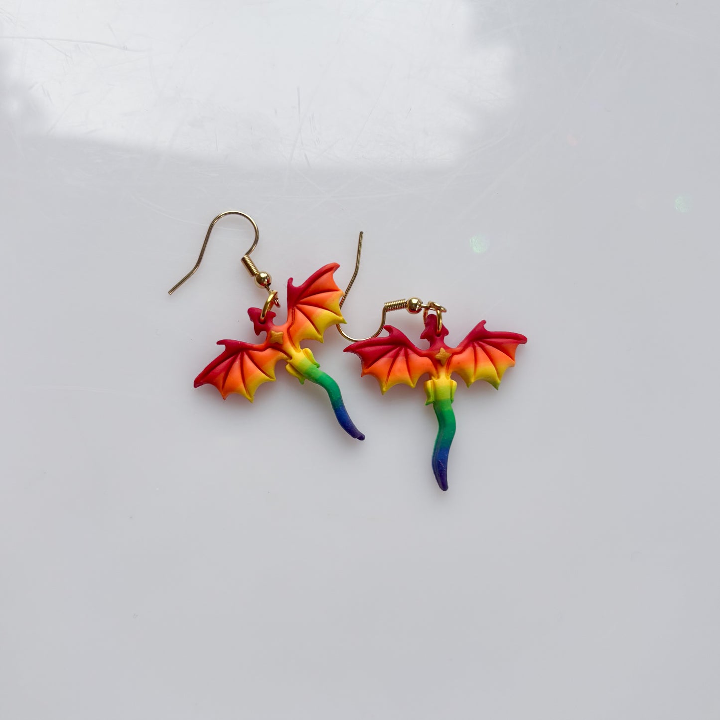 MINI DRAGON EARRINGS (RAINBOW FLAG)