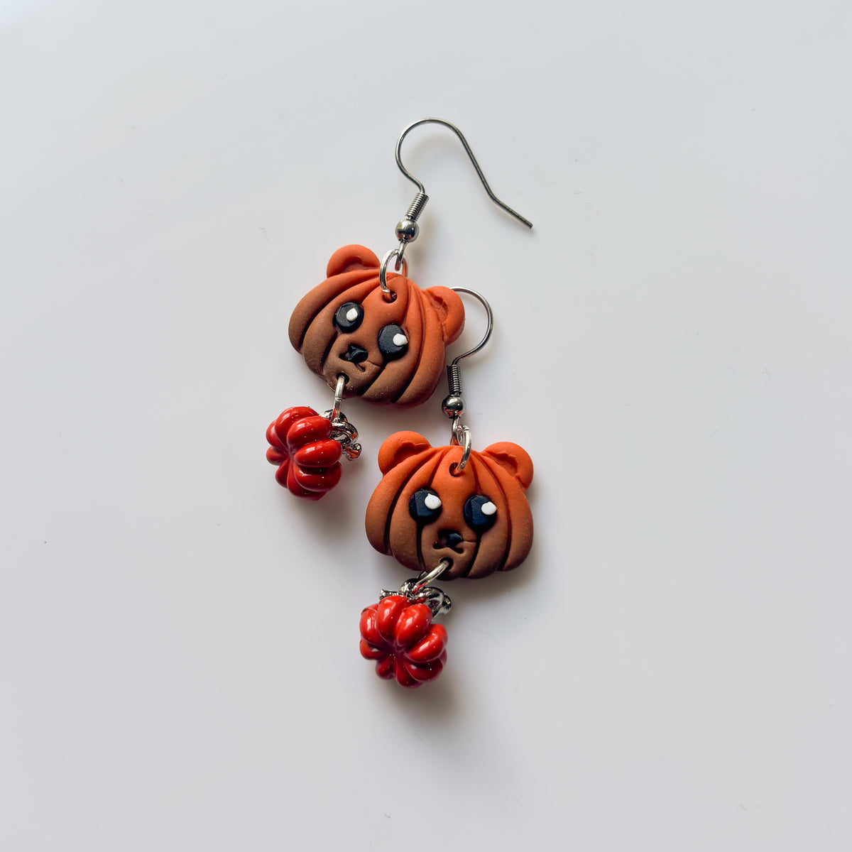 PUMPKIN BEAR HEAD EARRINGS