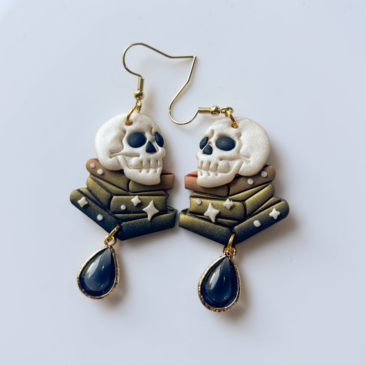 SKULLS ON BOOKS EARRINGS