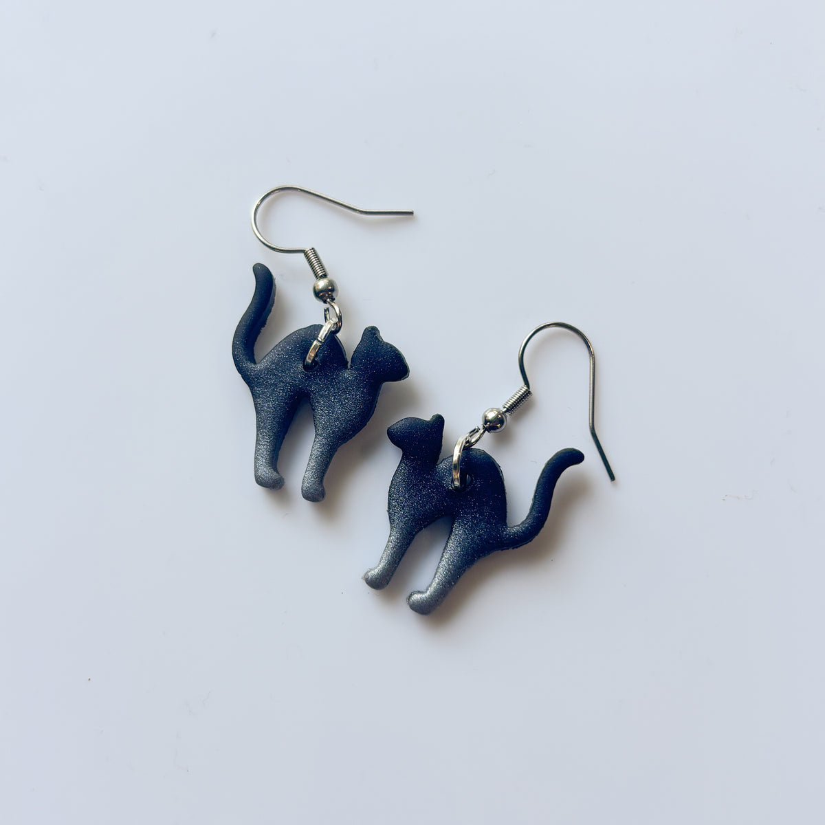 BLACK SILVER OMBRE CAT EARRINGS
