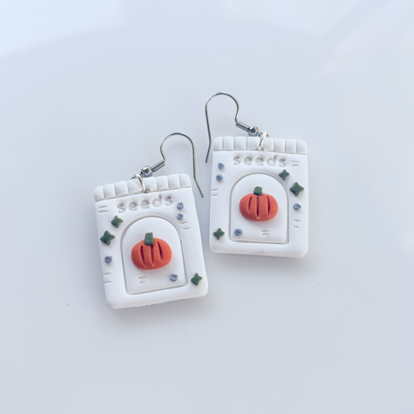 PUMPKIN SEED PACKET EARRINGS