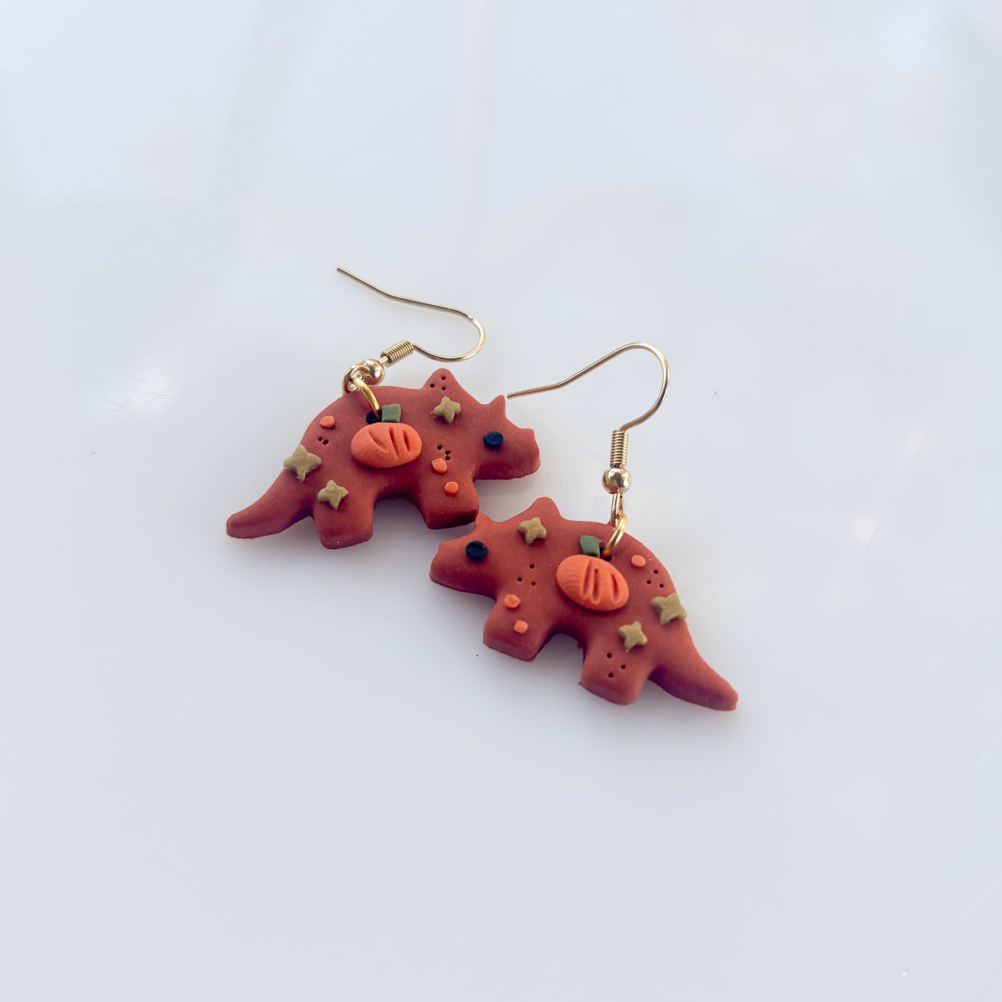 PUMPKIN TRICERATOPS EARRINGS