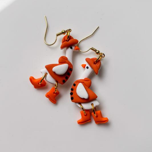 FALL GEESE IN RAINCOAT EARRINGS
