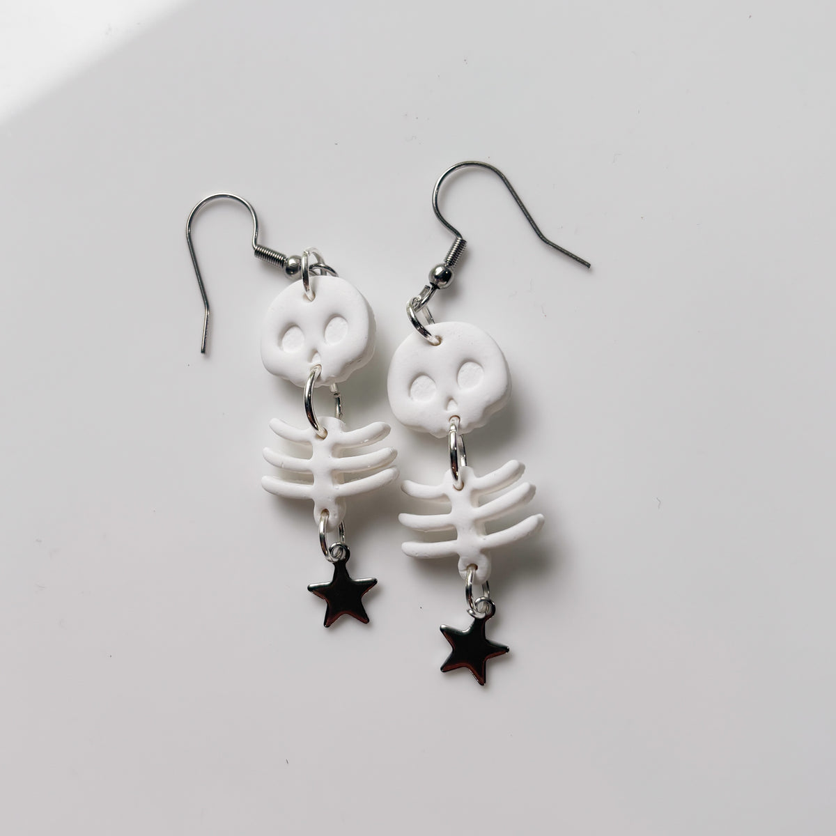 SKULL & RIB DANGLE EARRINGS