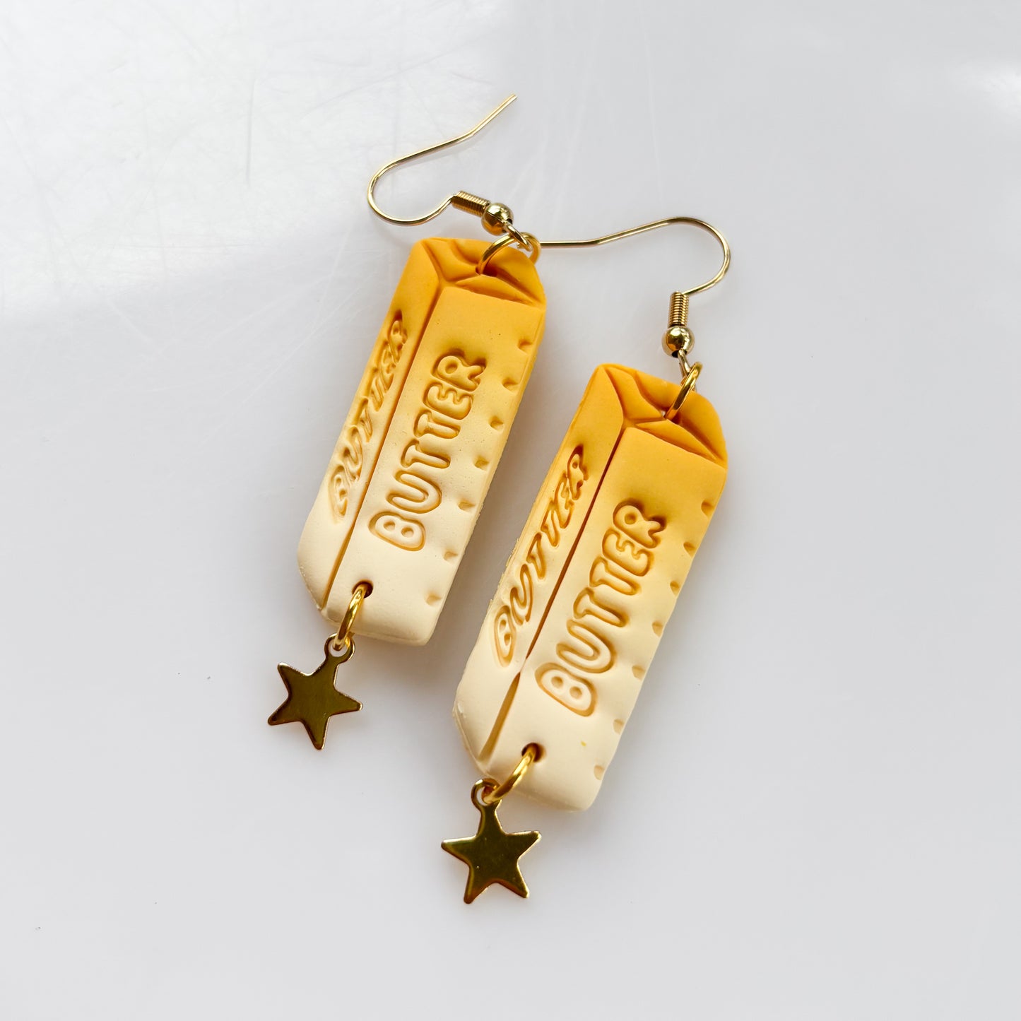 BUTTER STICK EARRINGS