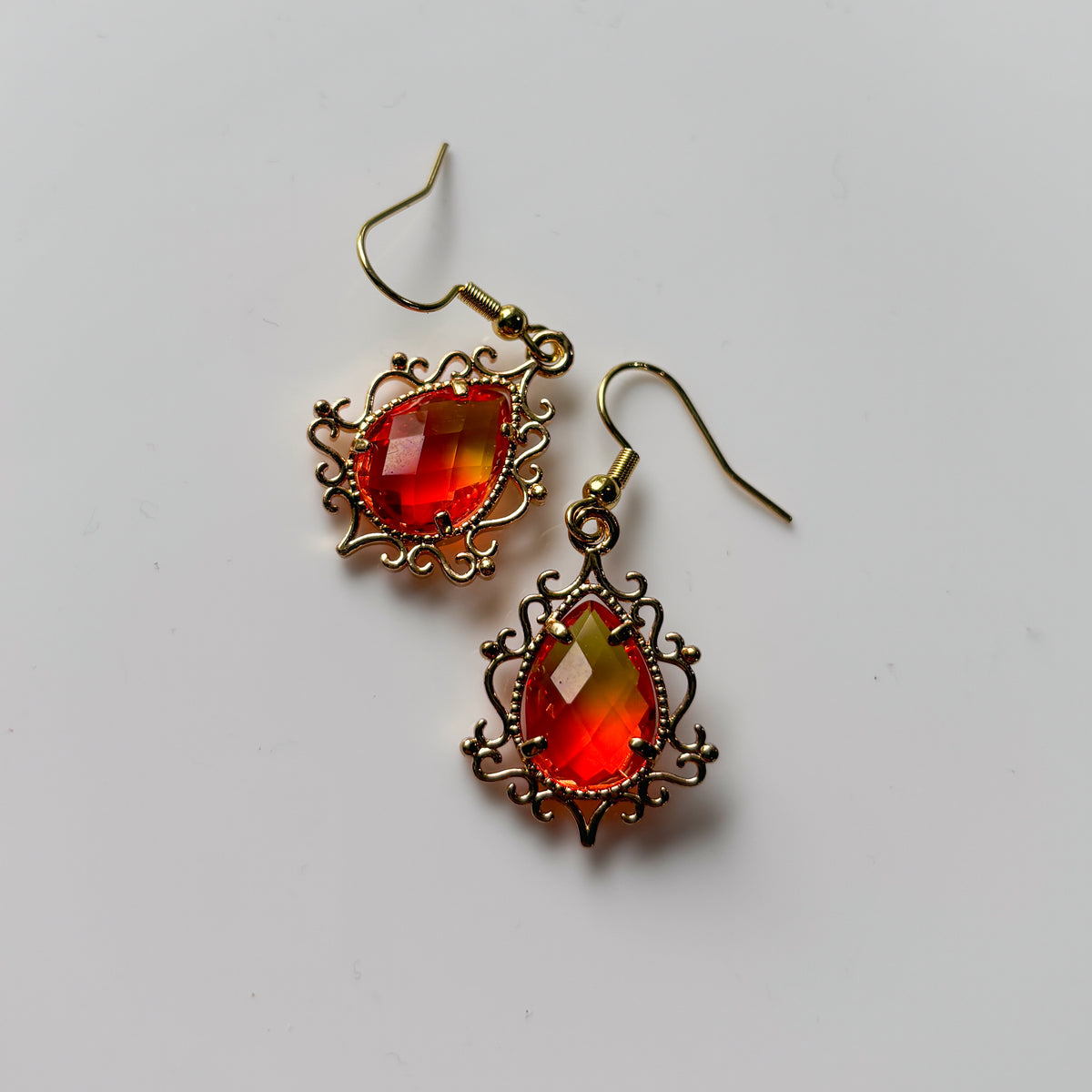 ORANGE ORNATE CHARM EARRINGS