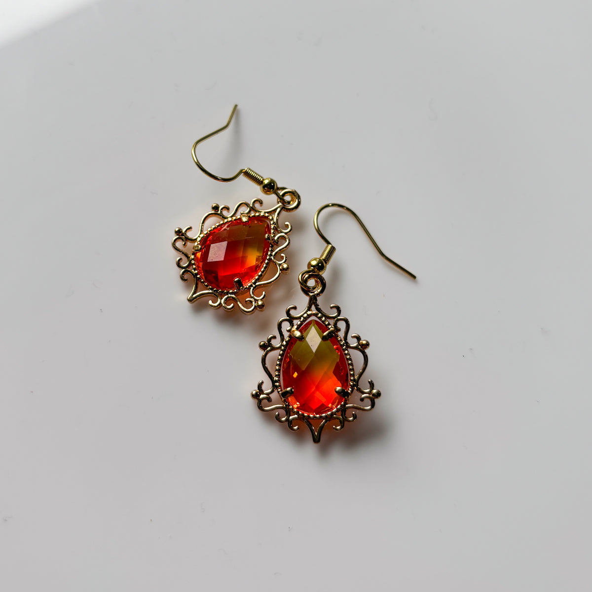ORANGE ORNATE CHARM EARRINGS