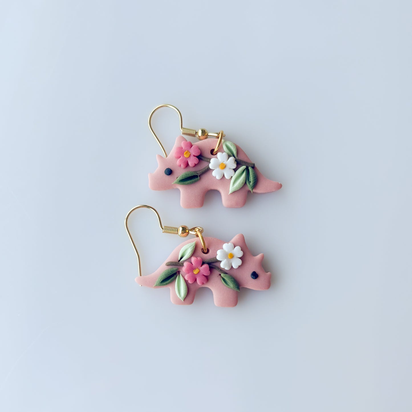 SAKURA DINO EARRINGS (TRICERATOPS)