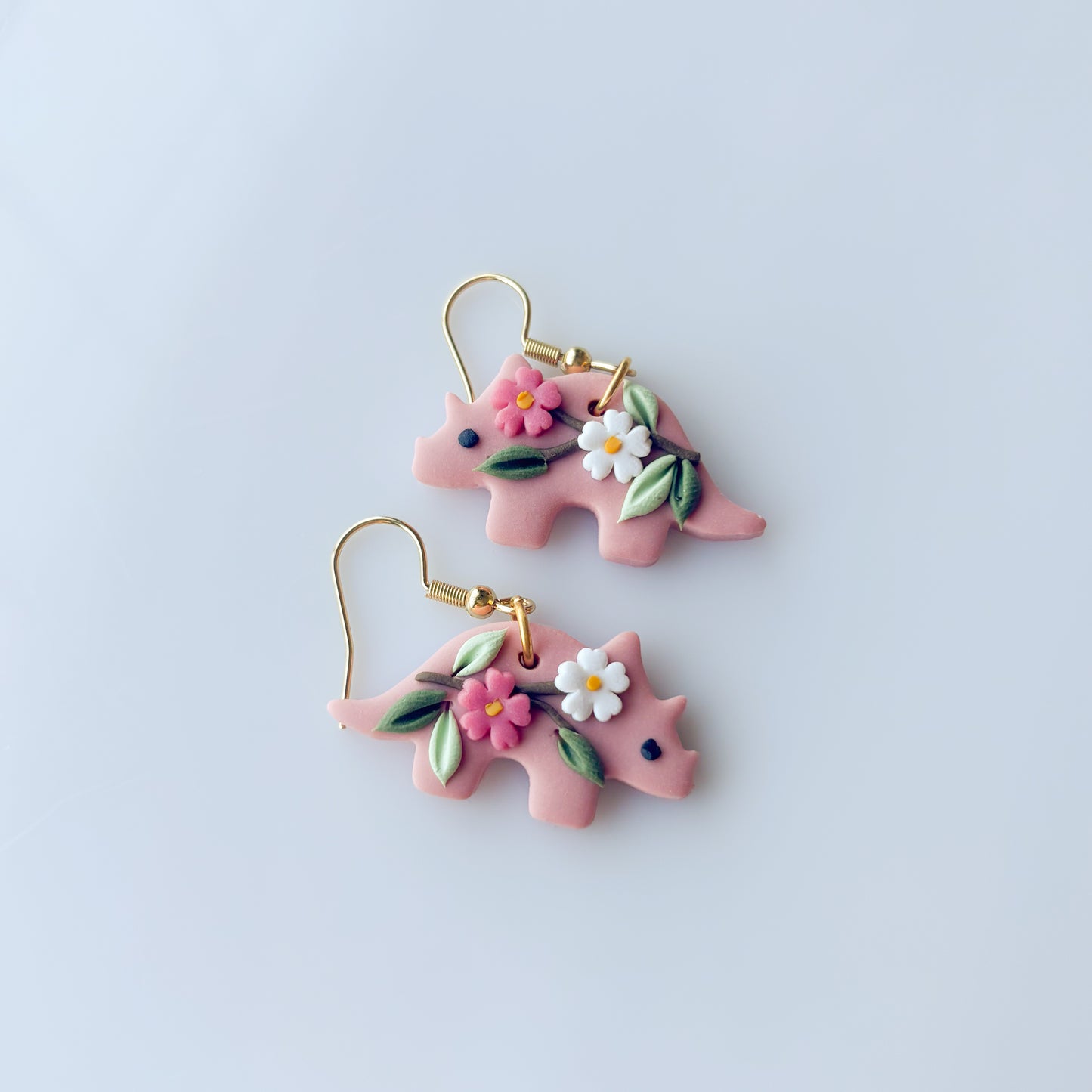 SAKURA DINO EARRINGS (TRICERATOPS)