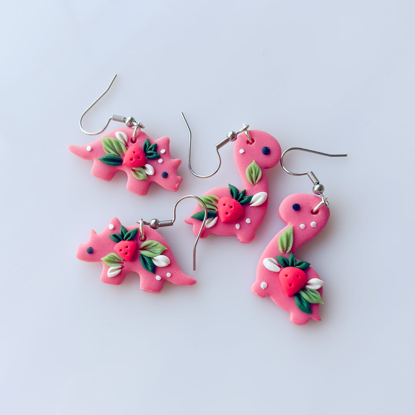 STRAWBERRY DINO EARRINGS (TRICERATOPS)