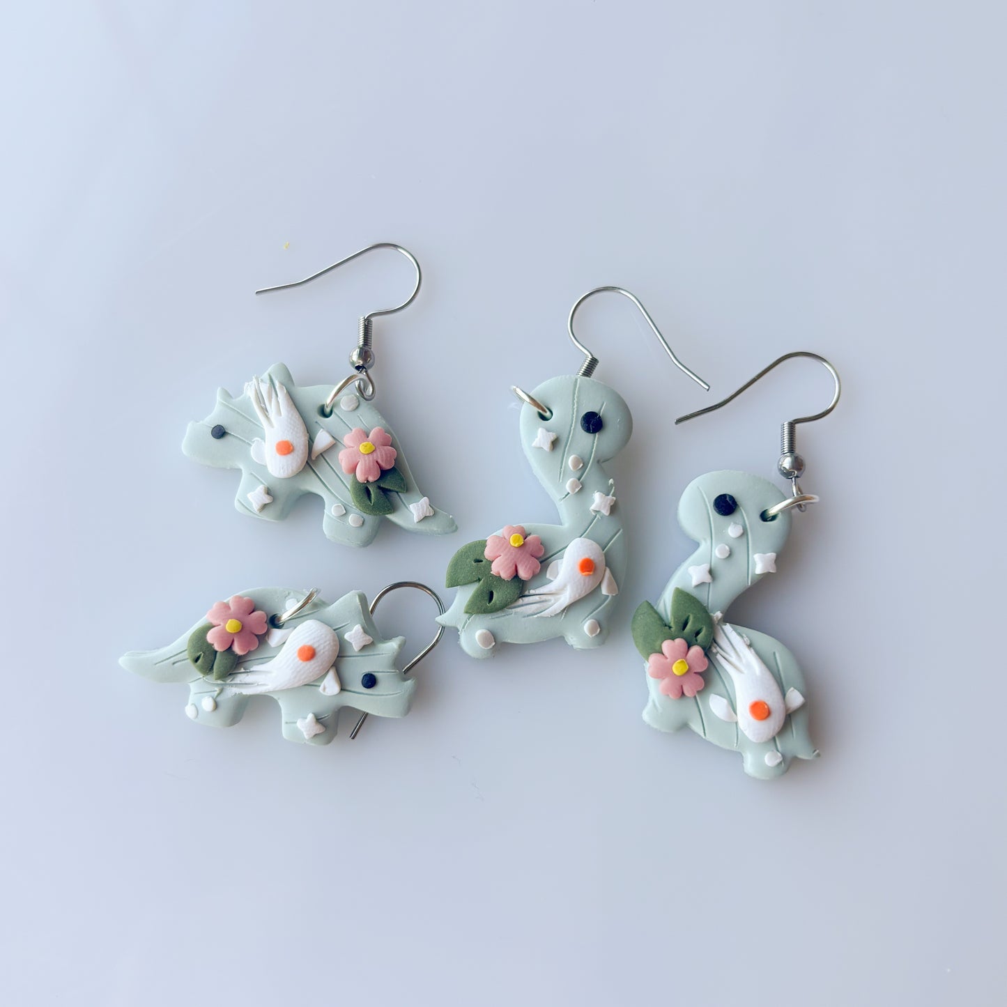 KOI DINO EARRINGS (TRICERATOPS)